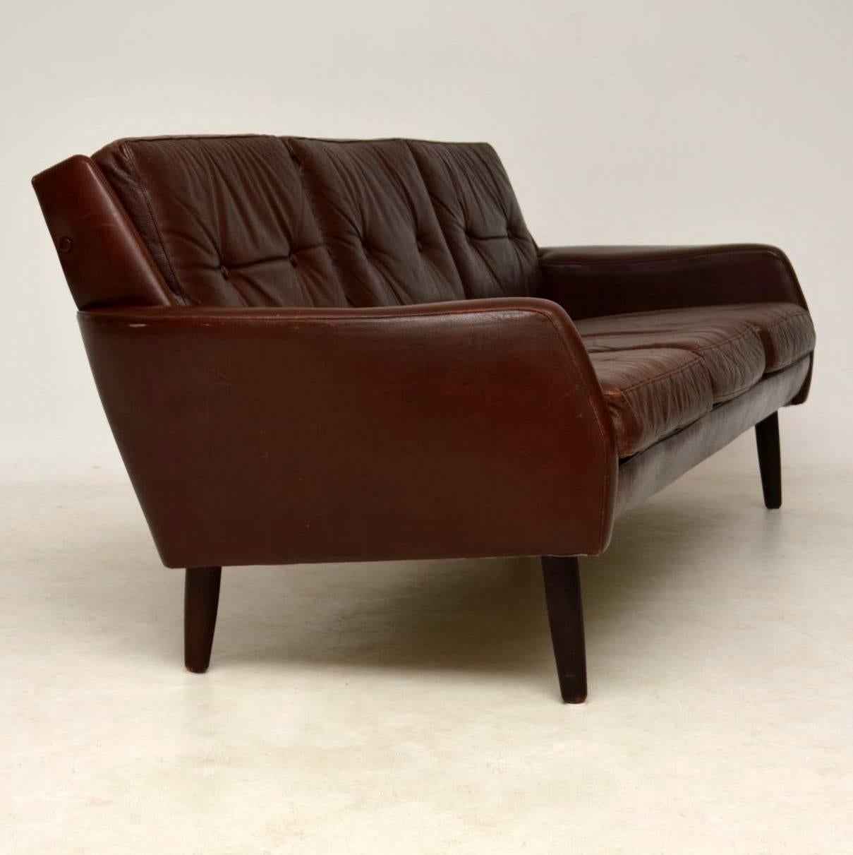 A stunning and very well made vintage Danish leather sofa, this dates from around the 1960-1970s. It’s in great original condition and is very comfortable. There is some minor surface wear to the leather here and there, there are no rips or