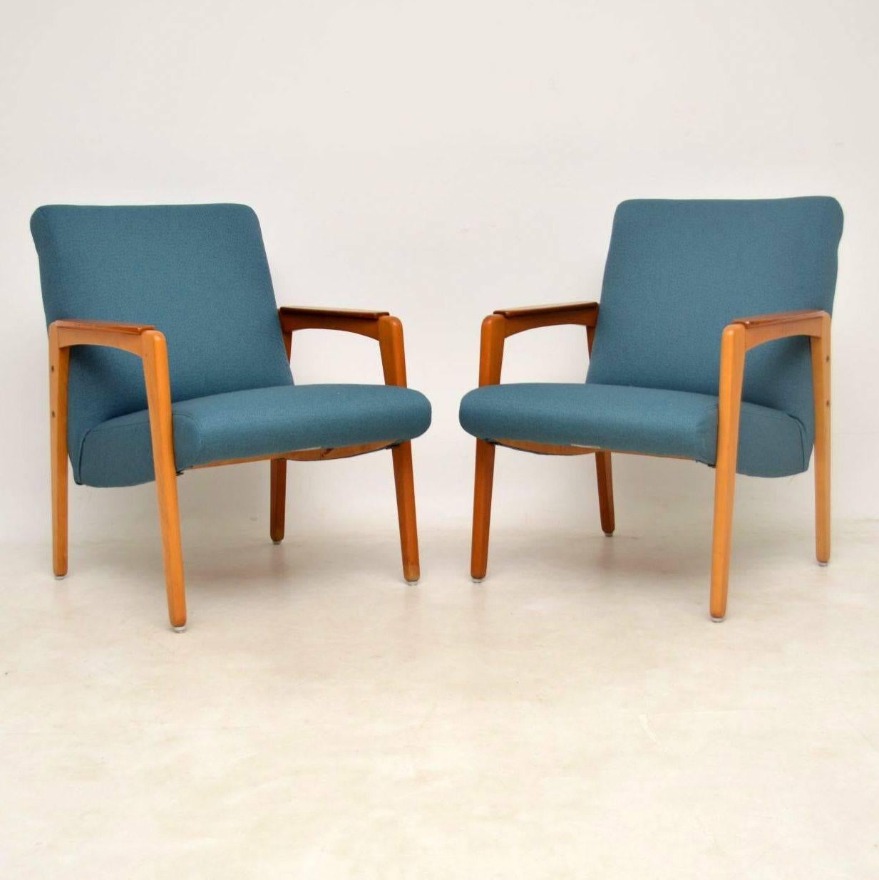 A stunning pair of vintage armchairs in teak, these were made in Sweden by Triva, they date from the 1950-1960s. They are in superb condition for their age and are very comfortable. The teak frames are clean, sturdy and sound and we have had these