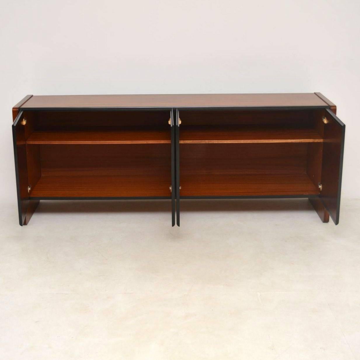 A beautiful and very well made Danish vintage sideboard, this dates from around the 1960s-1970s. We have had this stripped and re-polished to a very high standard, the condition is superb throughout. It has a lovely color and beautiful grain