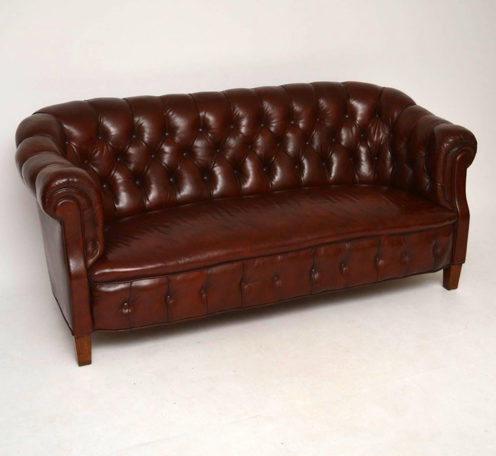 This antique Swedish deep buttoned leather Chesterfield sofa has very generous proportions and is very comfortable. The leather is all original and in good condition. It's not like the normal English traditional chesterfields, because the back is