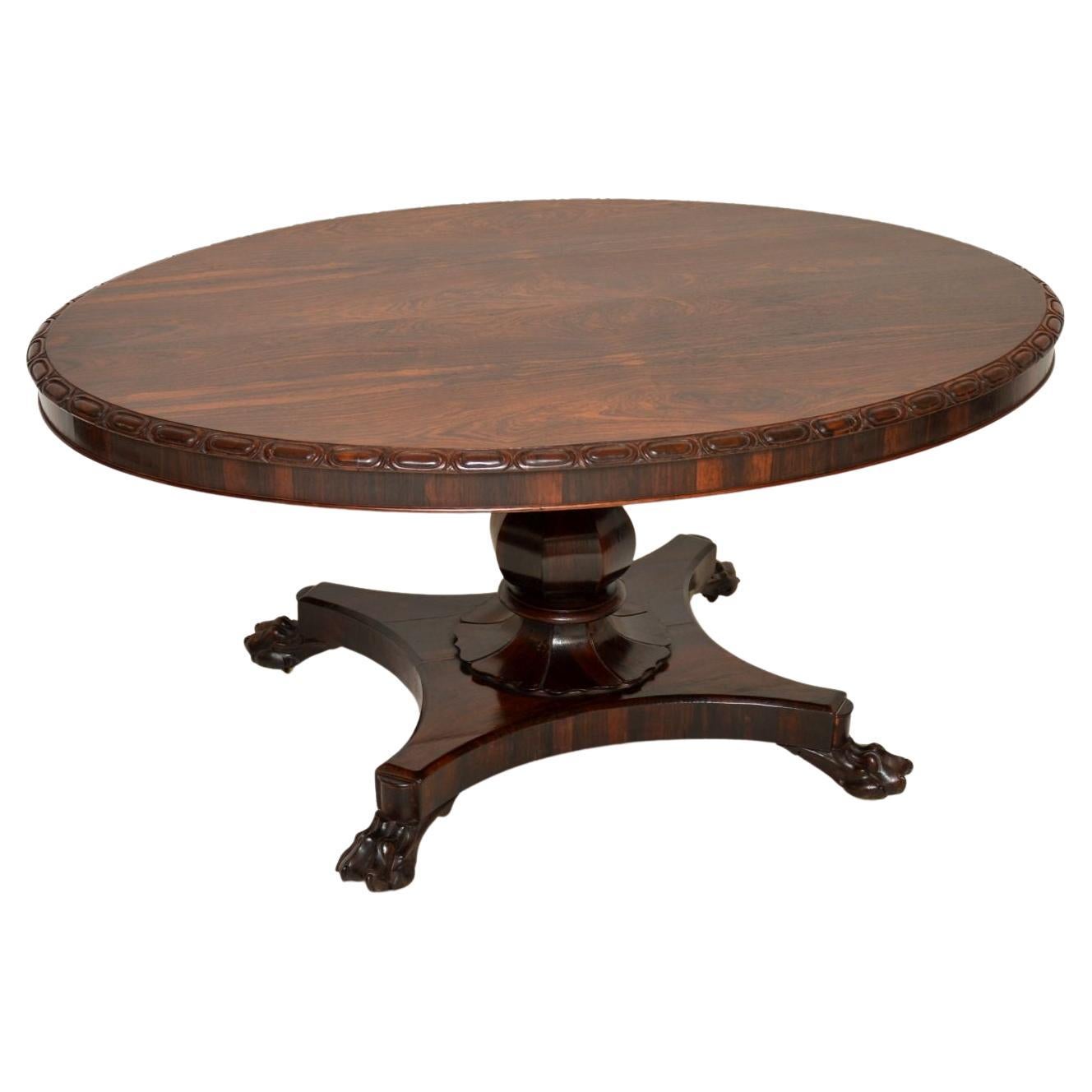 A fine example of a William IV period table. This was made in England, it dates from the 1830-40’s.

It is of superb quality, with lovely carving on the edge of the oval top and a beautifully carved platform base. The design of this table,