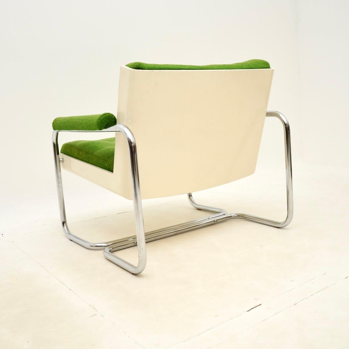 Sillón vintage de acero tubular con respaldo de concha de mediados de siglo en Bueno estado para la venta en London, GB