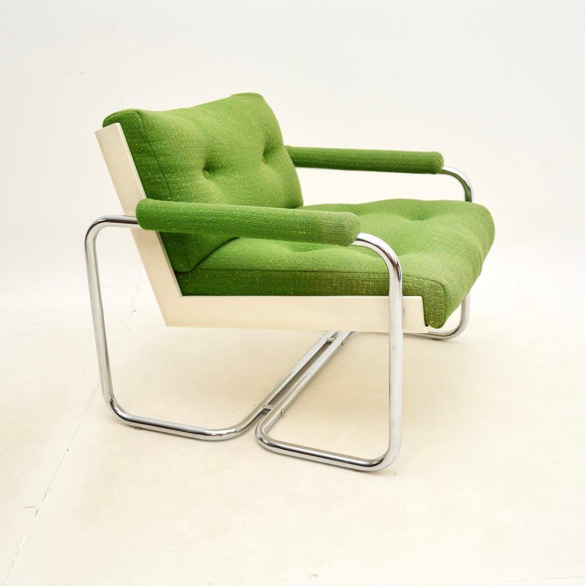 Sillón vintage de acero tubular con respaldo de concha de mediados de siglo Moderno de mediados de siglo en venta