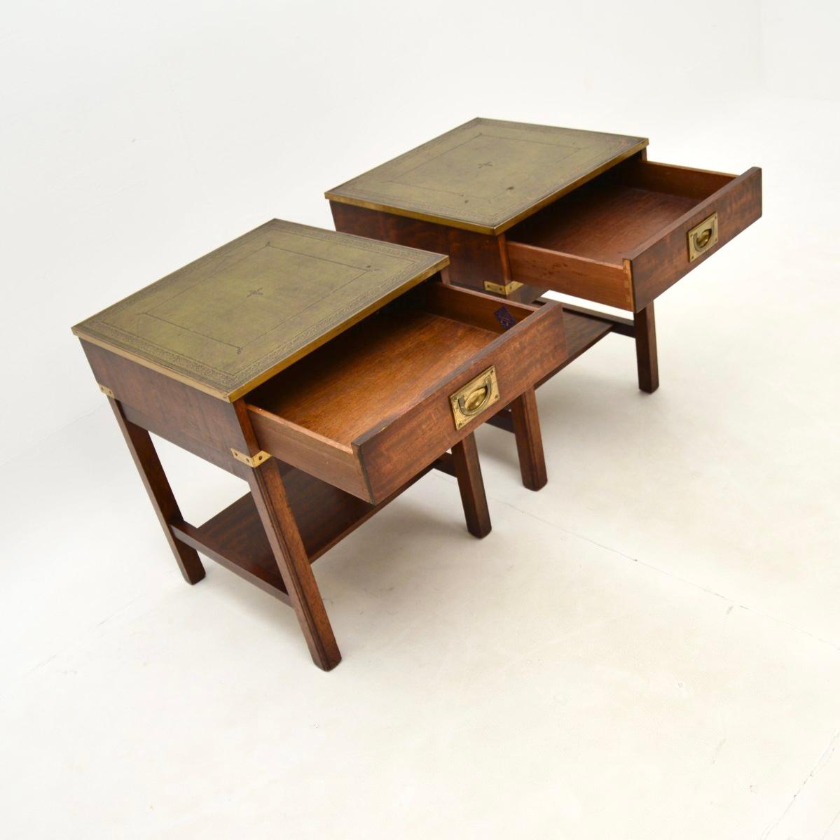 A smart and very well made pair of antique military campaign style side tables. They were made in England, and date from around the 1950’s.

The quality is fantastic, they are a very useful size and have polished backs, so can be used as free
