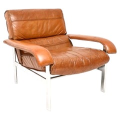 Fauteuil vintage en cuir et chrome de la marque Pieff