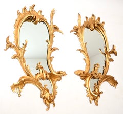 Coppia di specchi antichi francesi in legno intagliato e dorato
