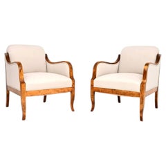 Paire de fauteuils anciens en bouleau satiné suédois