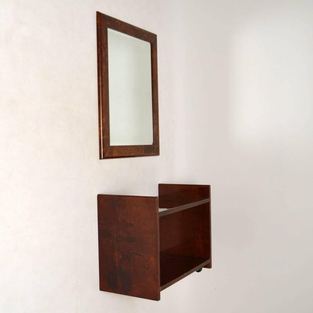 A stunning and very rare mirror with matching side table, this was designed by the famous Italian designer Aldo Tura, it dates from the 1960-1970s. It's made from lacquered goatskin parchment, and the quality is amazing. This in superb condition