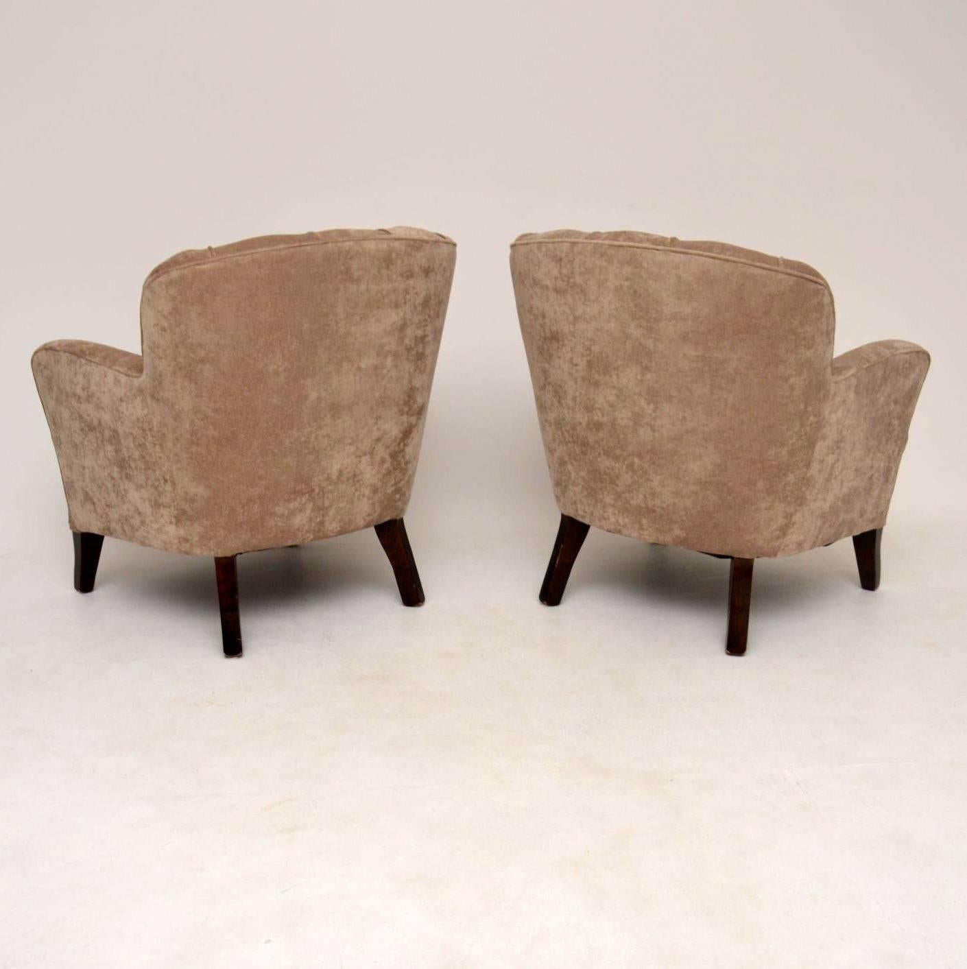 This pair of Swedish 1930s Art Deco armchairs also come with a matching three-seat sofa, which is showing in this listing and also shown separately on the web site. This whole set came over from Sweden and has been re-upholstered in a lovely velour