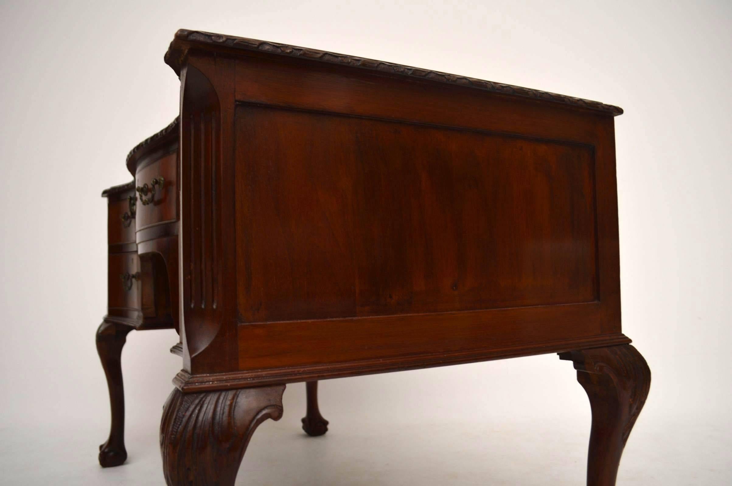 English Antique Carved Mahogany Leather Top Desk
