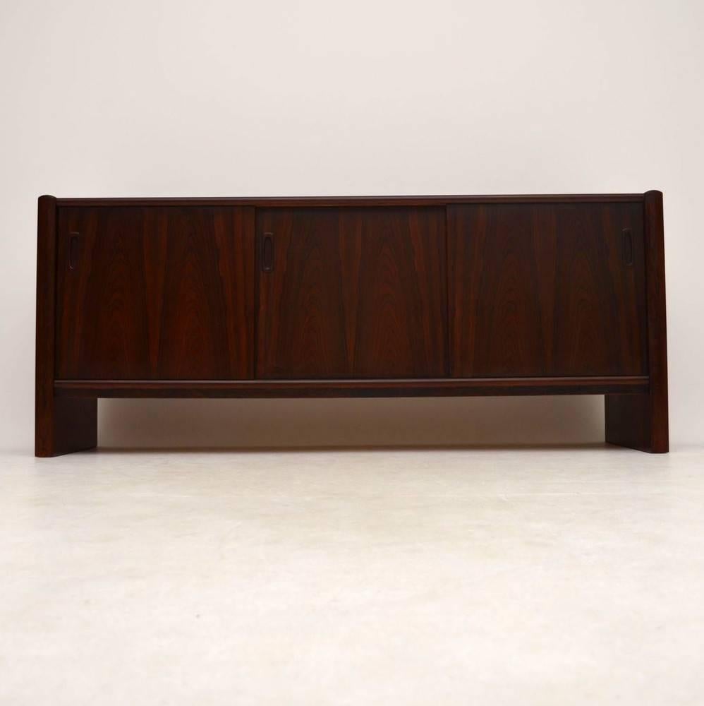 A stunning rosewood sideboard made by Interform collection, this was made in Denmark and dates from around the 1970s. This was stripped and re-polished, it has a lovely colour and grain patterns; the condition is superb for its age.

Measures: