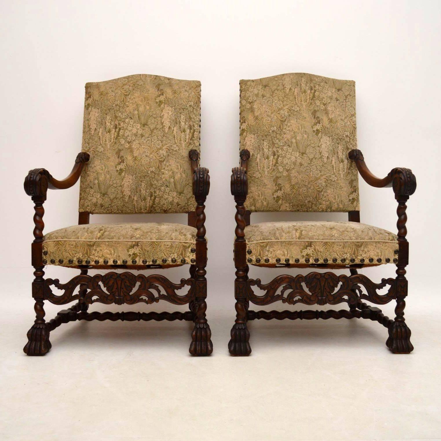 Very impressive large pair of antique Swedish Carolean style upholstered armchairs in good condition and dating from around the 1890s period. They have high backs and the upholstery is the original cut velvet which is still in good condition. These