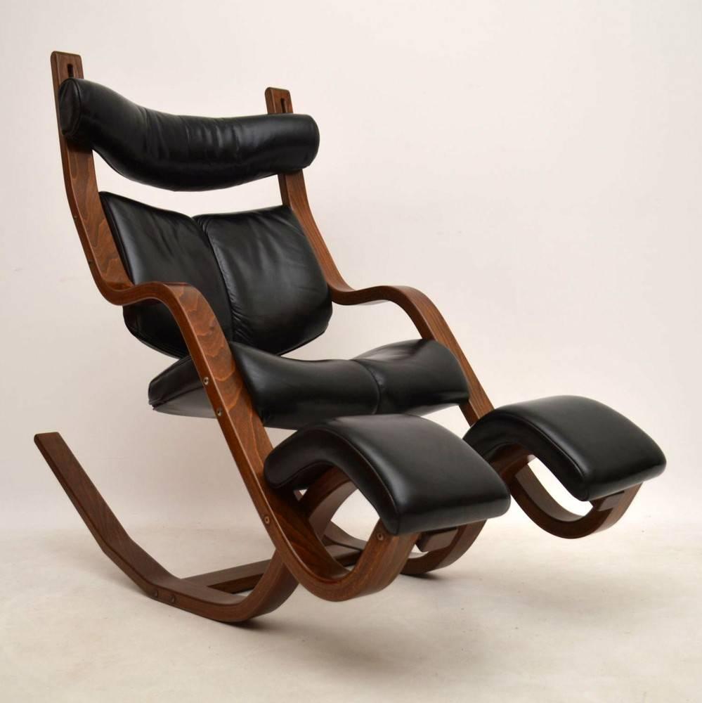 This is an amazing Gravity Blans armchair, designed by Peter Opsvik and made by Stokke in Norway. This is an early model, from when they were first produced in the early 1990s. We have had the frame stripped and re-polished, the leather has also
