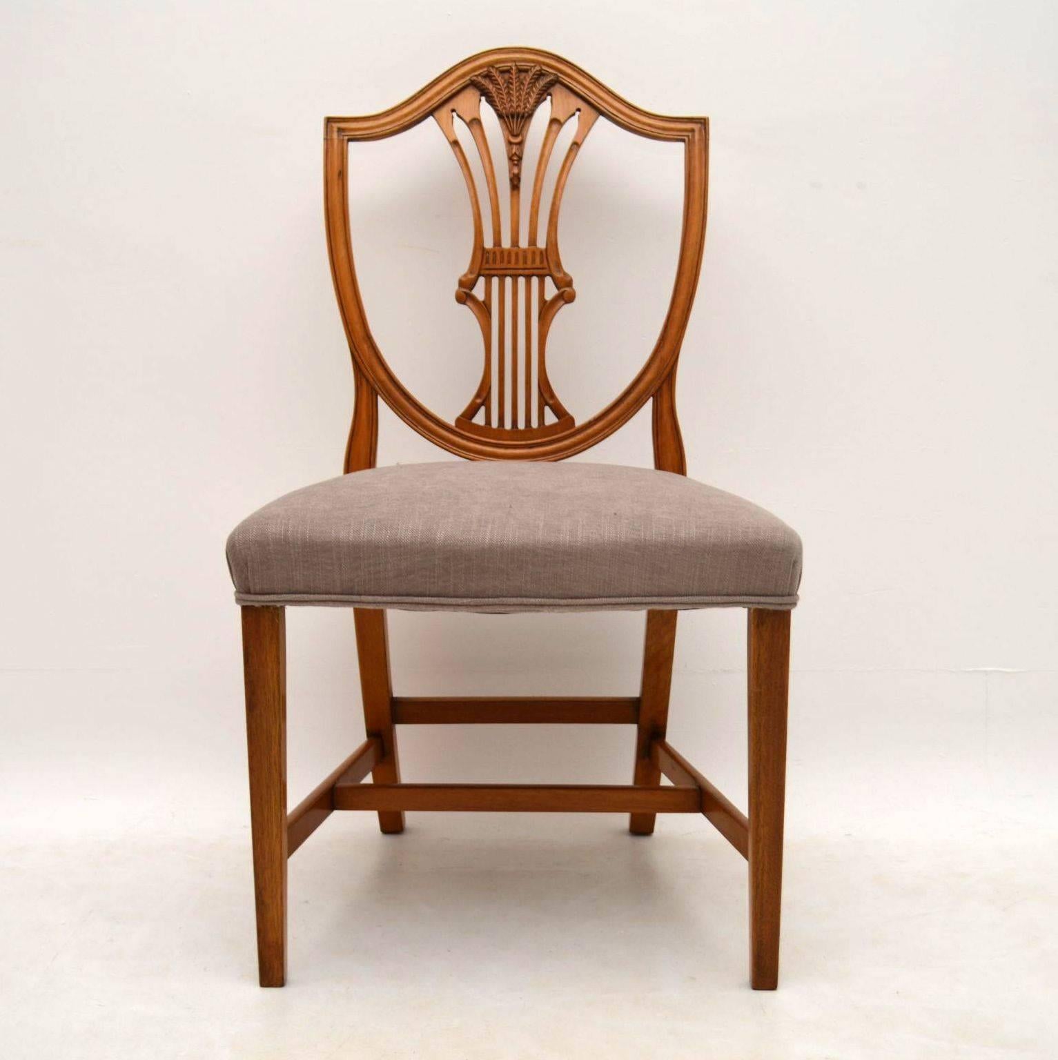 It's hard to find old sets of ten dining chairs and especially sets this nice. These chairs are antique Adam style dating from around the 1930s period & in great condition. They are mahogany & the wood is quite light in colour. They have been