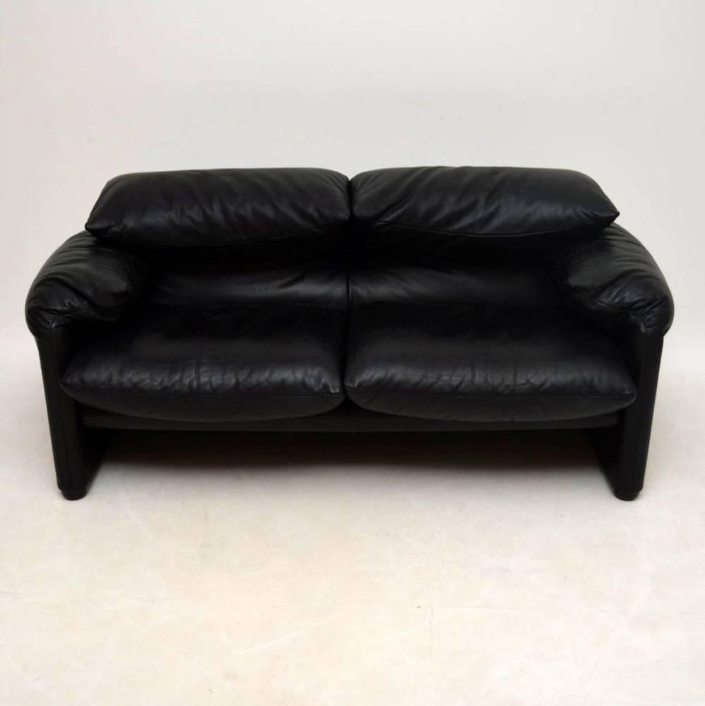 A beautiful, top quality and extremely comfortable black leather sofa. This is called the 'Maralunga' sofa, it was designed by Vico Magistretti, and was made by Cassina in Italy. The condition is superb with hardly any wear to be seen. It has a