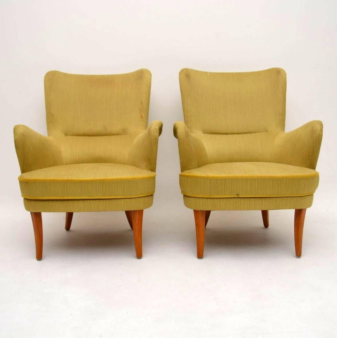 A stunning pair of vintage armchairs made in Sweden, these date from the 1960s, they were designed by Carl Malmsten. The fabric is original and needs to be replaced, the price is for the chairs as seen. If you’d like us to re-upholster them please