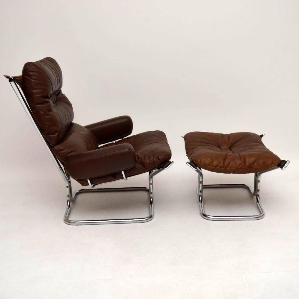 A smart and extremely comfortable leather armchair and stool, these were made in Norway in the 1970s, they were designed by Ingmar Relling. They have chrome frames with solid rosewood central pieces, the condition is excellent for their age. There