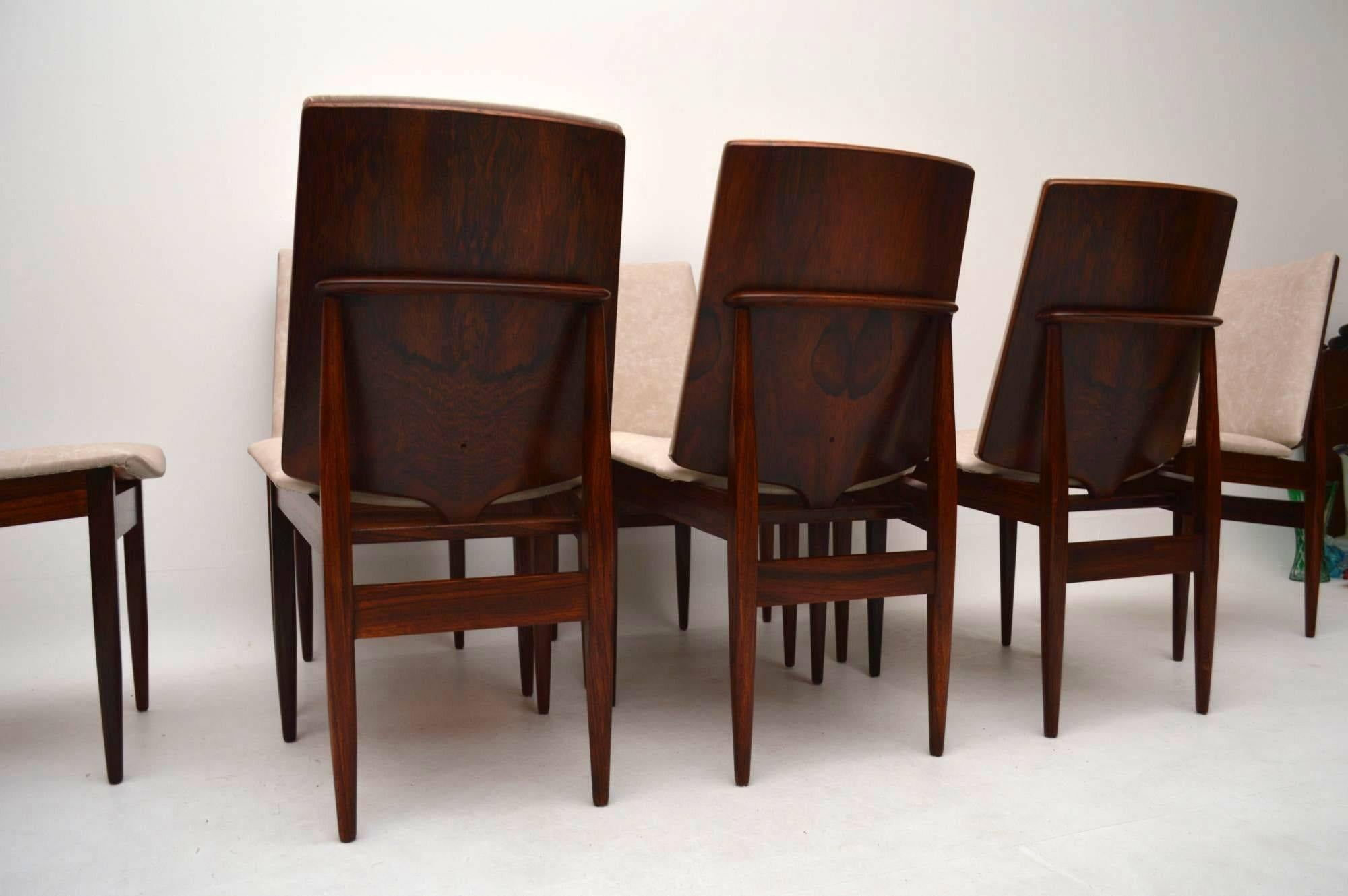 A magnificent set of eight rosewood and leather vintage dining chairs, these date from the 1960s. We’re not completely sure of the designer, they look very much like a Danish design by Arne Hovmand-Olsen, but they came with a rosewood dining table