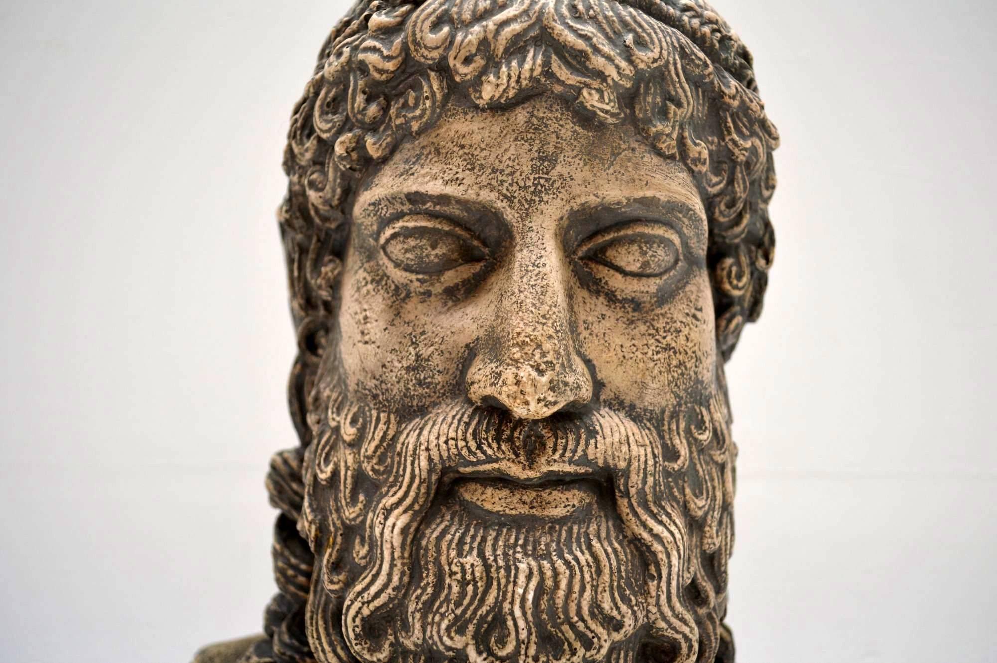 Antique classical bust of what looks to me like a ancient Greek warrior or philosopher. It's difficult to say, because we have tried to Google the face, but nothing seems to come up. Maybe someone out there may know? It give the appearance of