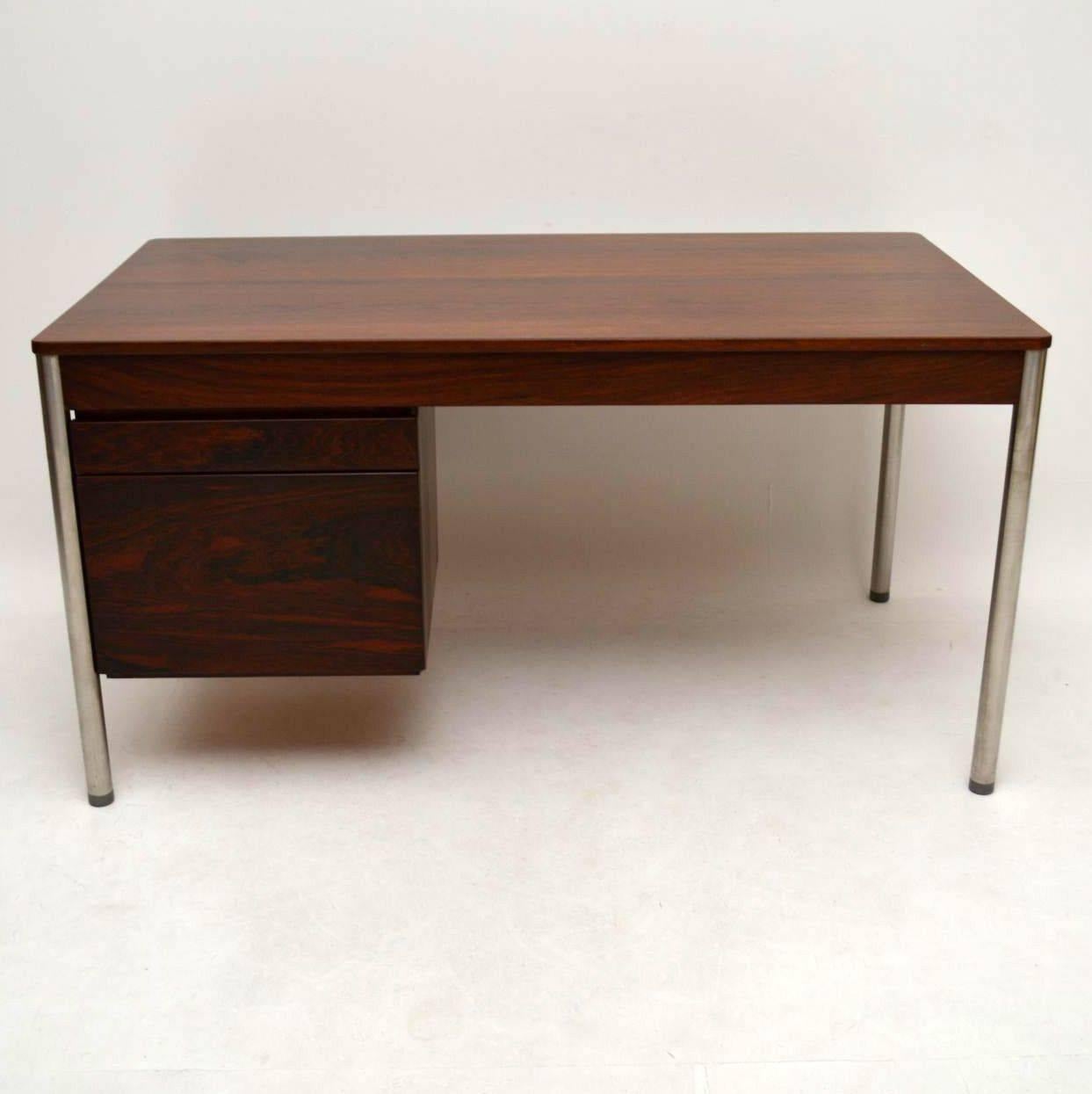 A stylish and rare one off vintage desk, this was made by Archie Shine and dates from the 1960s-1970s. The previous owner was a friend of Archie Shine, and we were told that Archie Shine himself made this for his wife when she asked him for a desk.