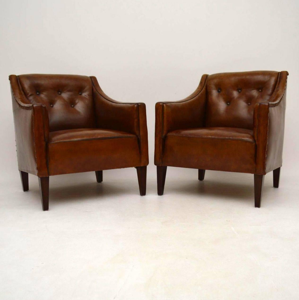 Stunning pair of antique Swedish leather armchairs in great condition dating to around the 1890-1910 period. The leather upholstery is all original, full of character and the color is magnificent. There are no holes, tears or splits to the leather