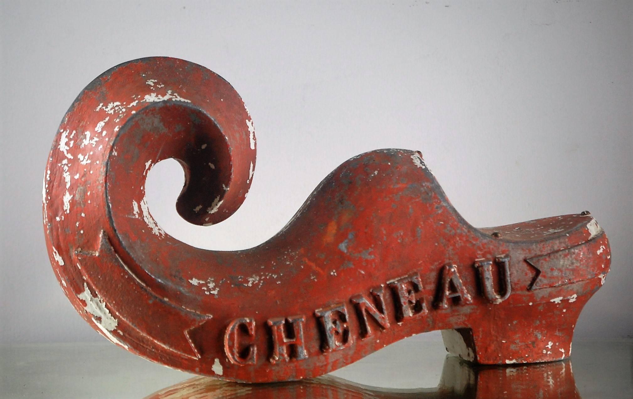 Wonderful stylised oversized clog makers trade sign of cast metal. Delightful patination and paint loss. Cheneau is the family name of the clog maker. Still a popular form of footwear at the time especially in the rural areas. Burgundy, France. All