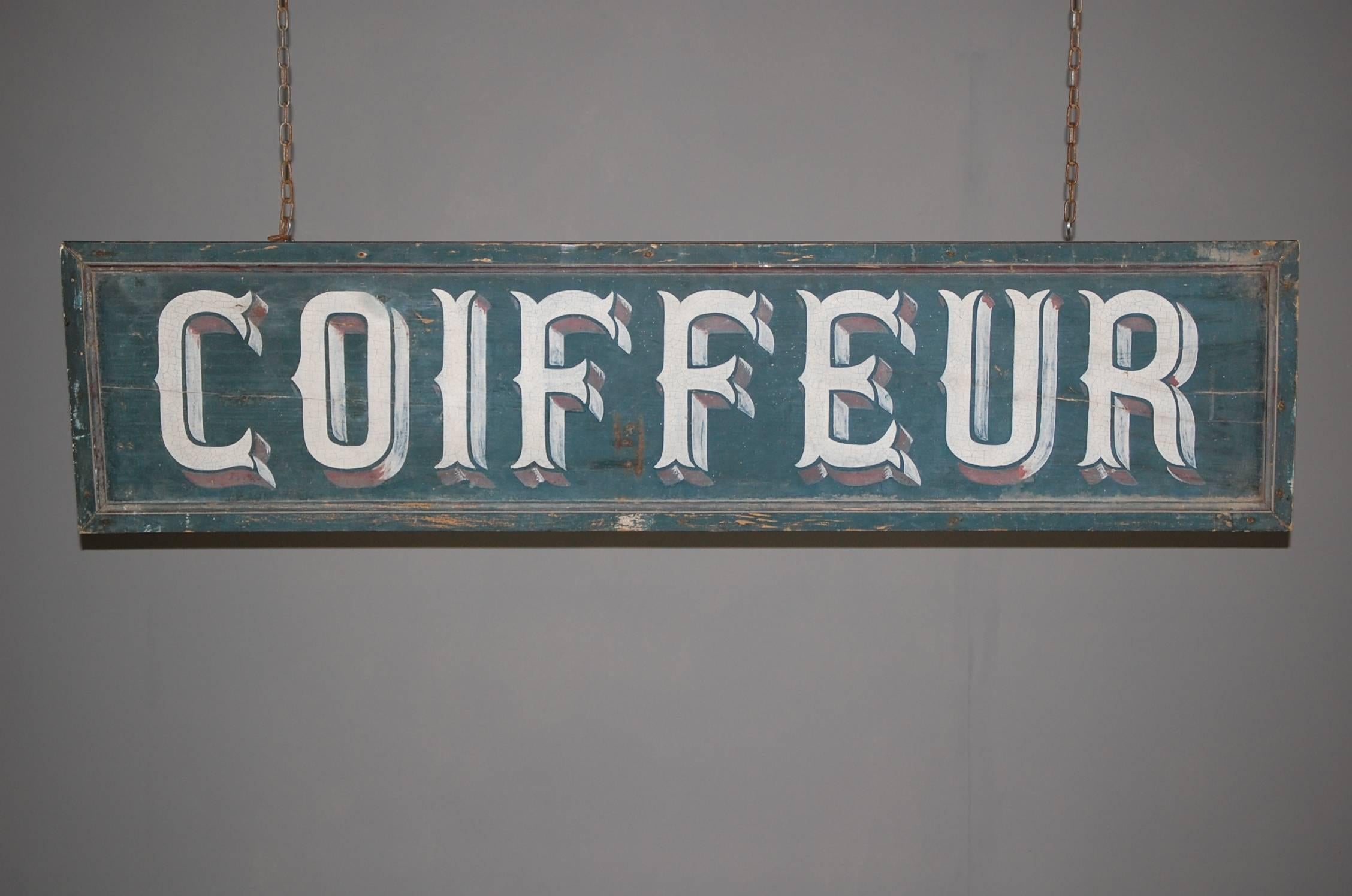 French Coiffeur or hairdresser trade sign hand-painted on timber boards wonderful patination, some light damage and distressing with minor paint loss in places.