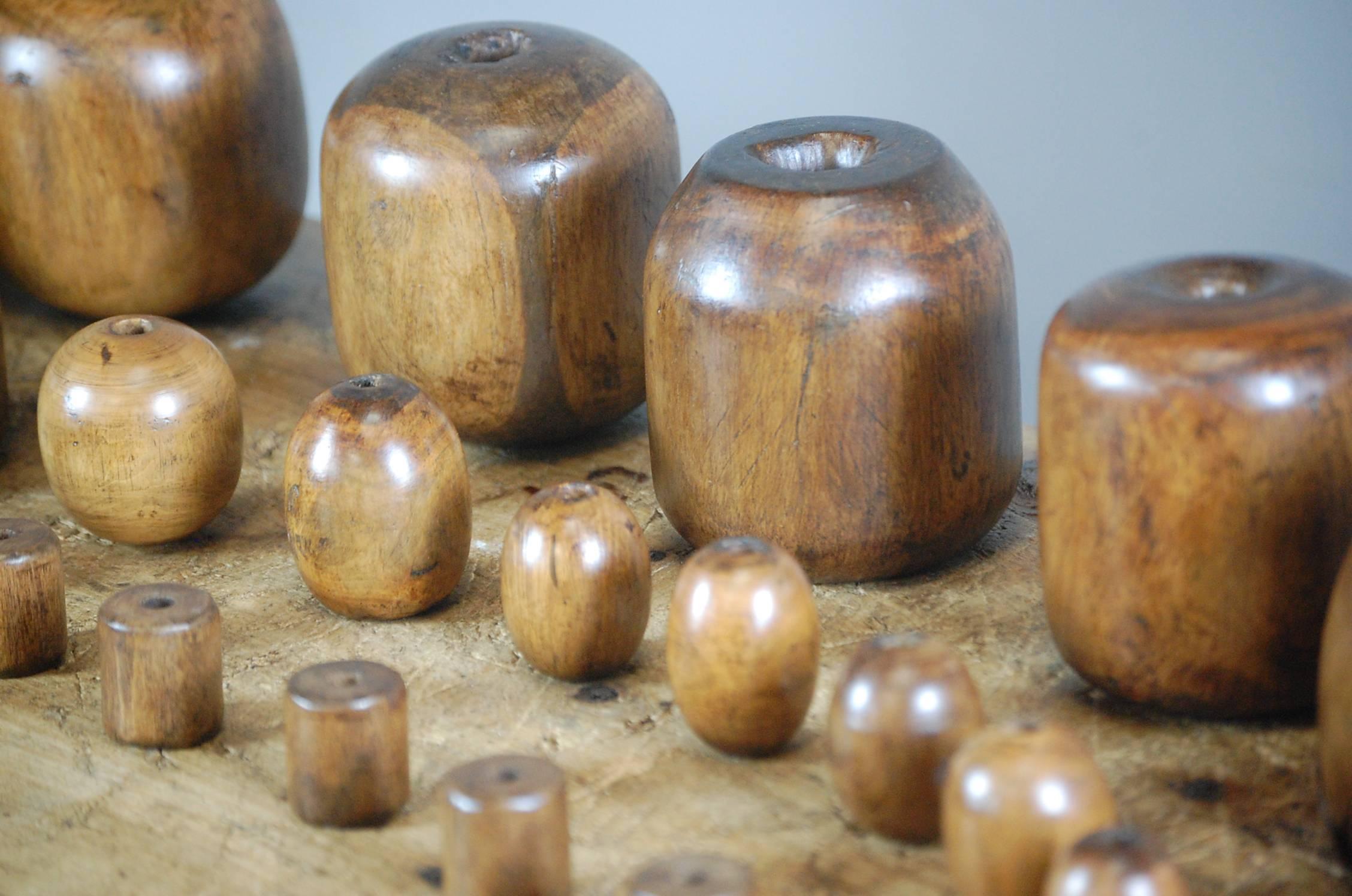 Wonderful collection of 29 late 19th and early 20th century Chogs and Bobbins of various sizes. These were used by plumbers for straightening and clearing pipework. These are Lignum Vitae, the self oiling nature of the wood and years of use leave