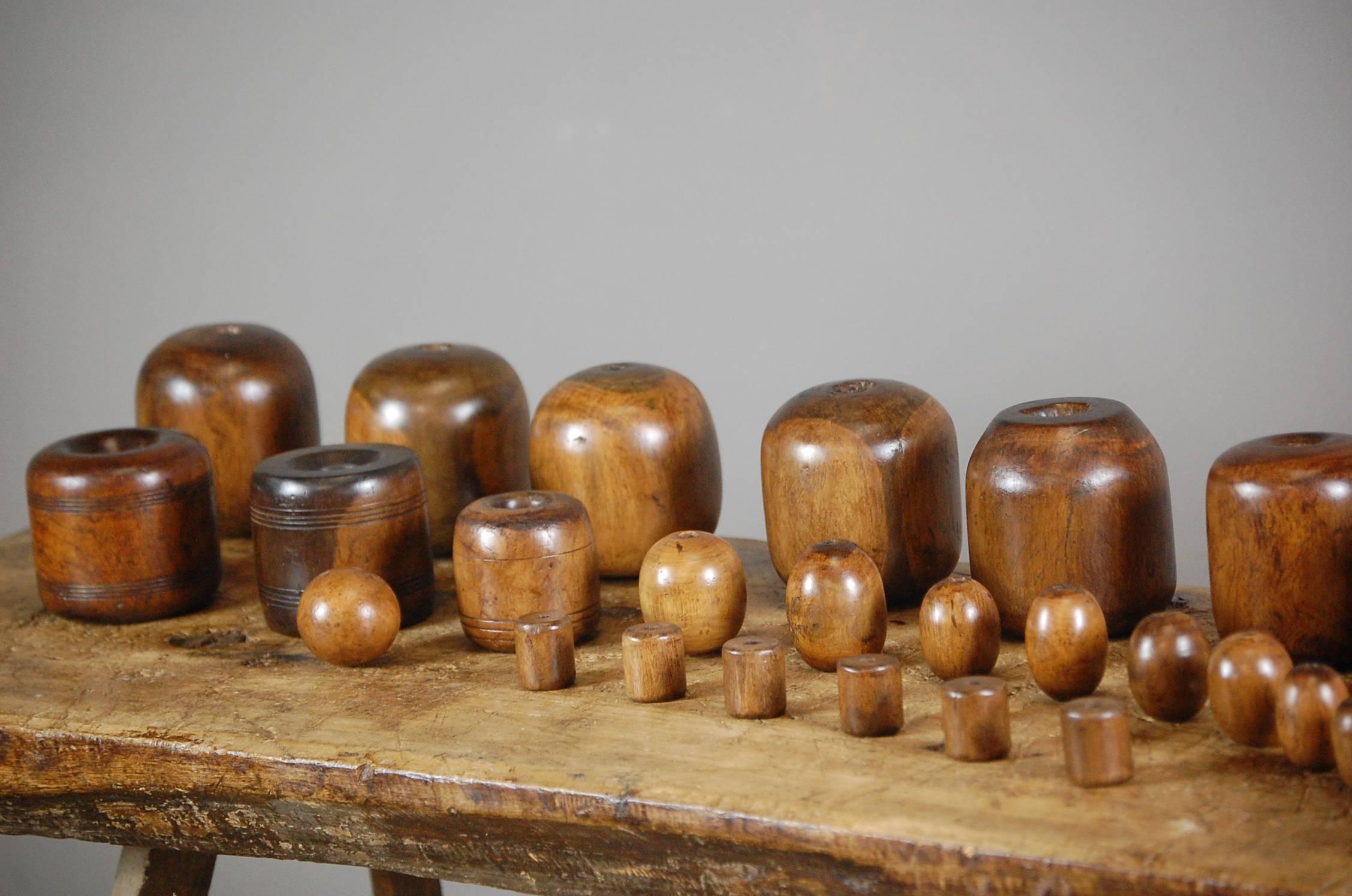 Collection of Lignum Vitae Plumbers Chogs and Bobbins 4