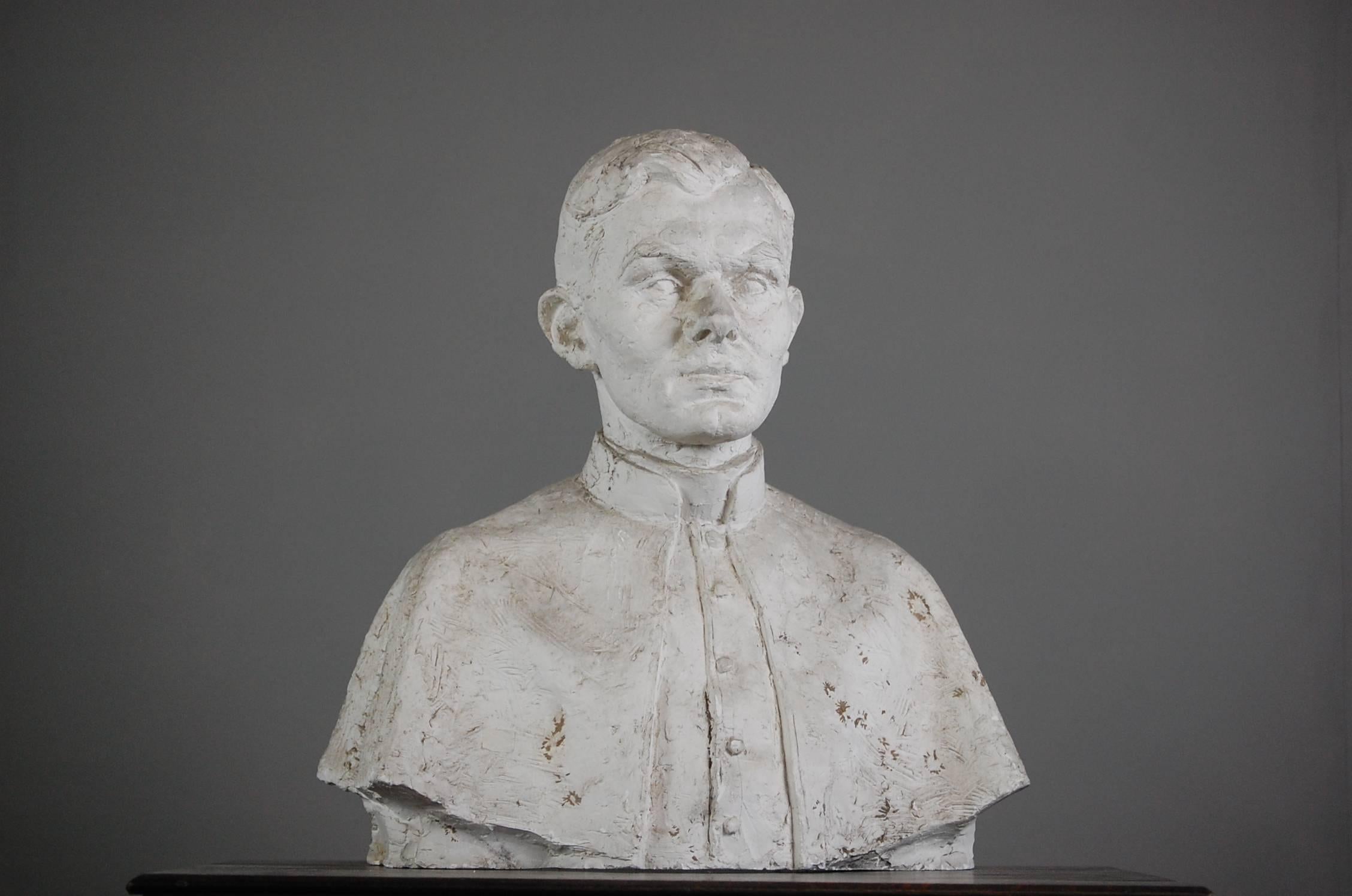 French plaster bust of a young serene religious male, great detail to casting. Wear is consistent with age. Unattributed, French, circa 1900.