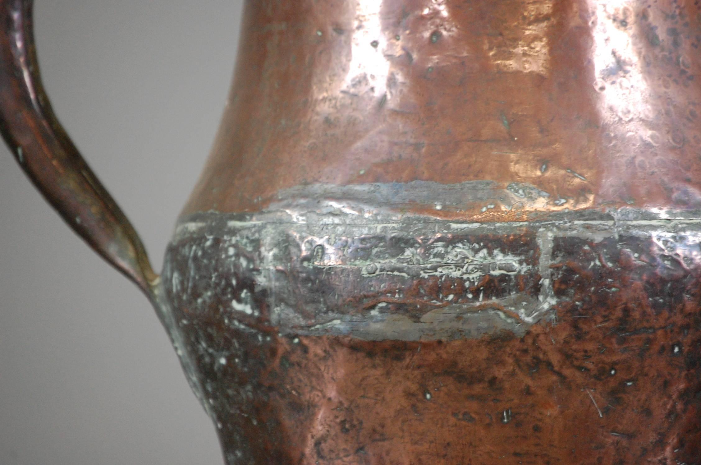copper watering can vintage