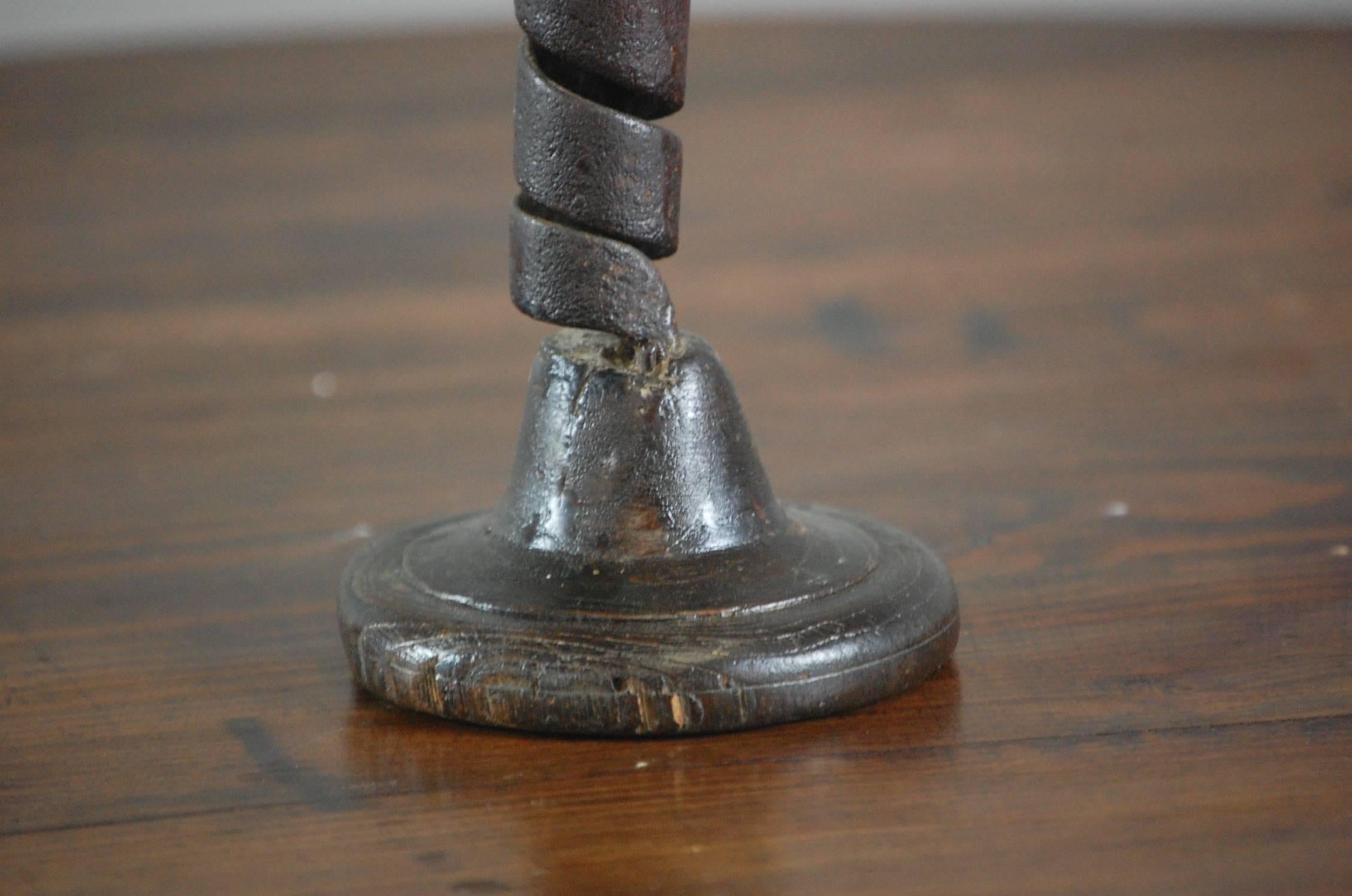 18th century French rat de cave candlestick, turned wood base, wrought iron. All original.