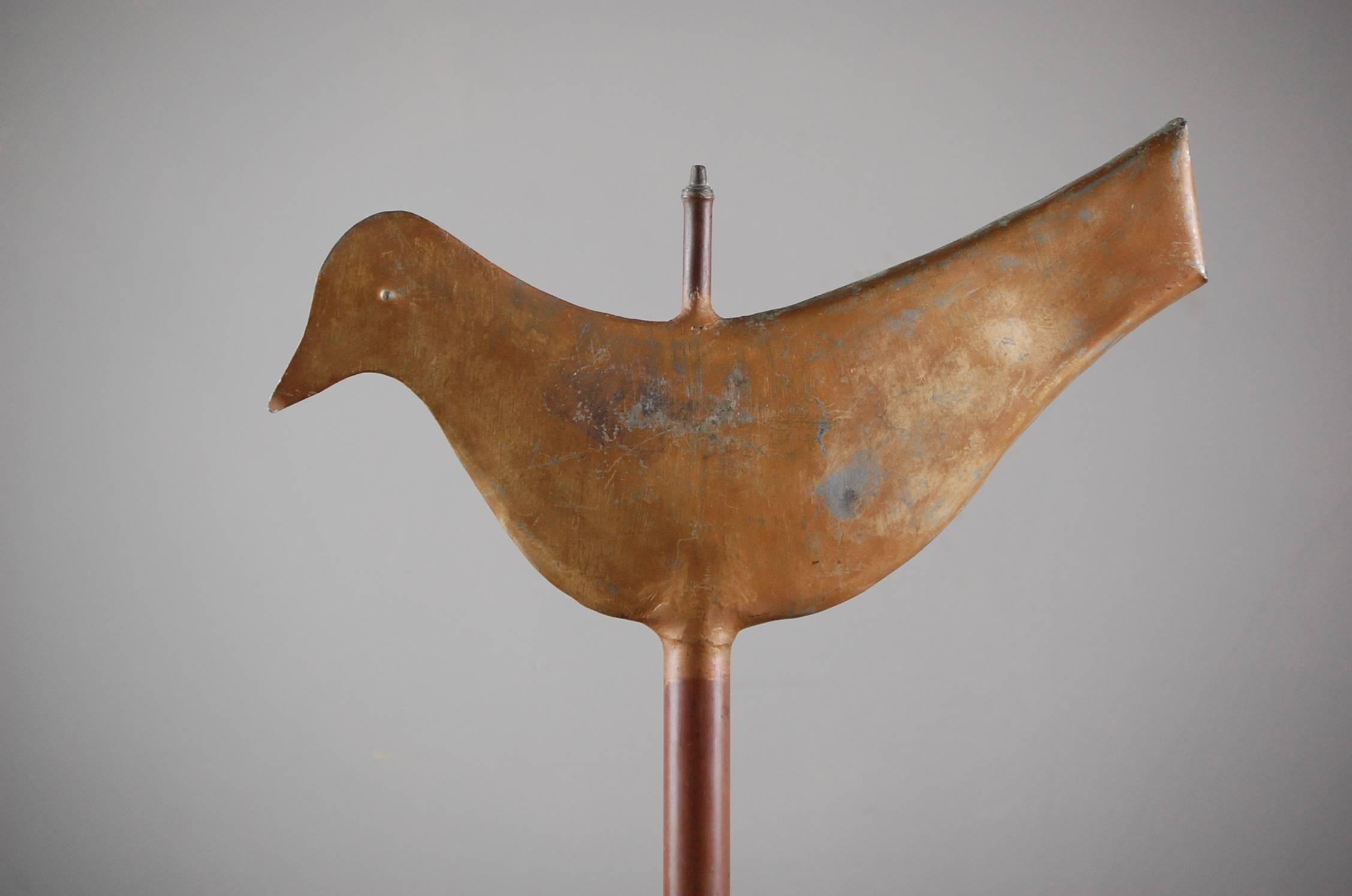 Full bodied stylised dove weathervane in zinc, contemporary stand, France, circa 1950. (Measurement inc. stand).
   