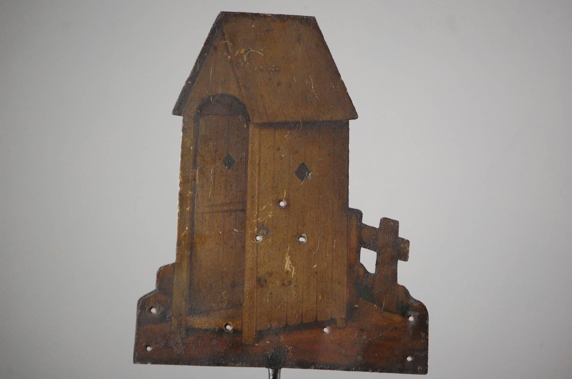 Late 19th century, painted sheet metal fairground target of a privy. mounted on a contemporary stand, wear to the rear, France, circa 1890.