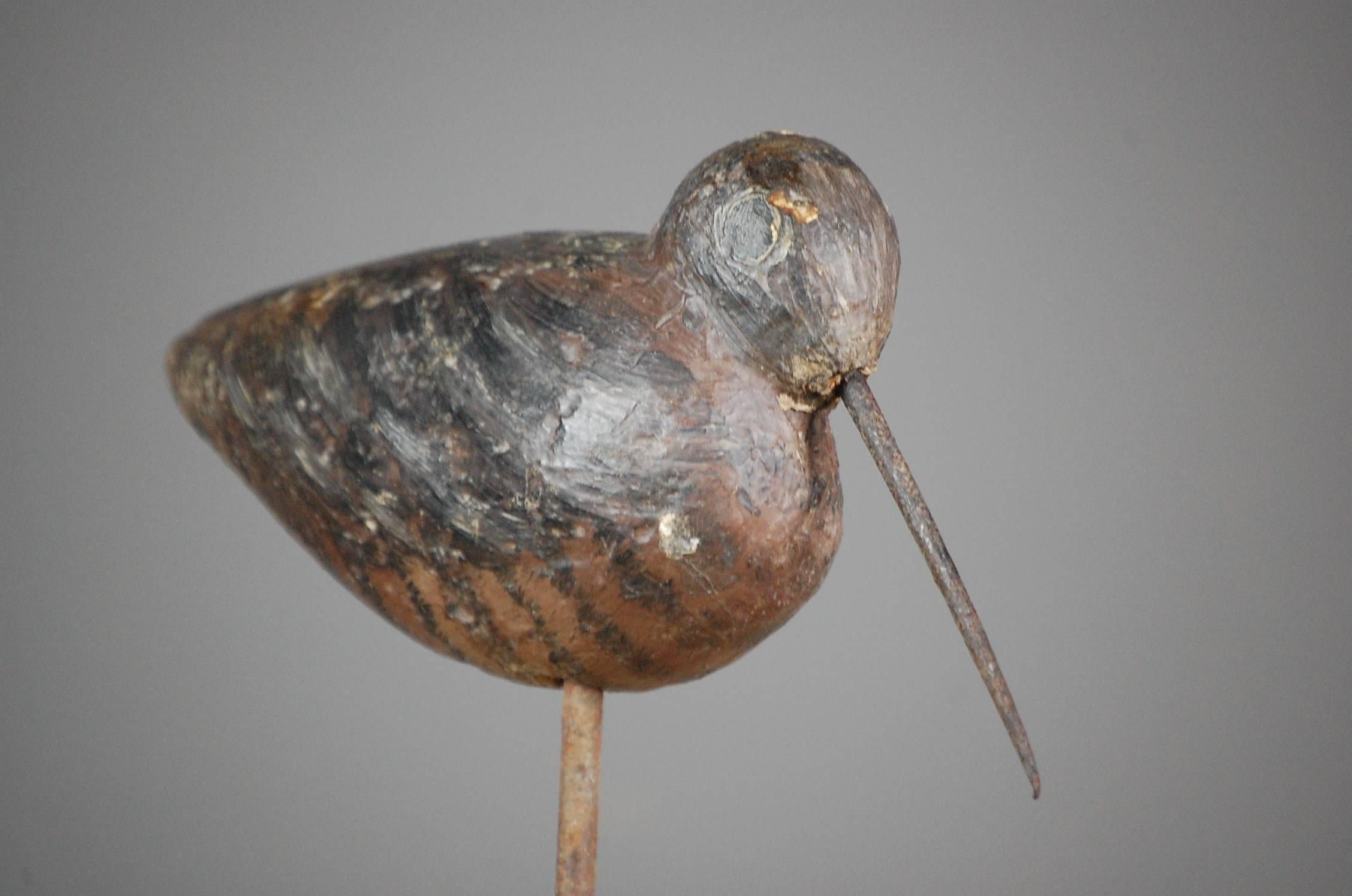 Late 19th century working woodcock or snipe decoy, original paint. Charming bulbous form. Unusual to find such decoys capturing the form of the particular they intend to imitate so well, France, circa 1890.