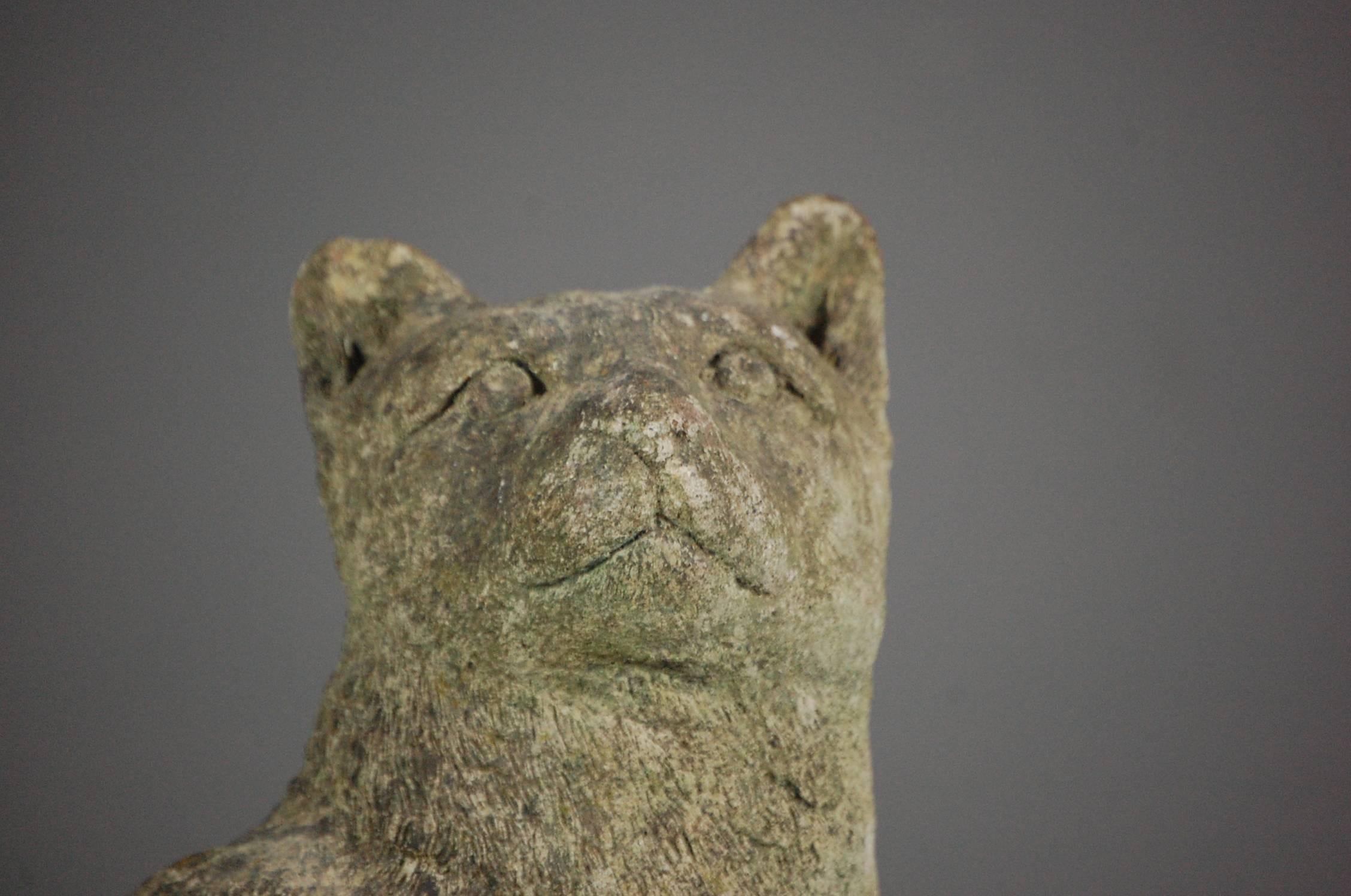 Reconstitute stone pussy cat, well weathered, life-size. English, circa 1950.