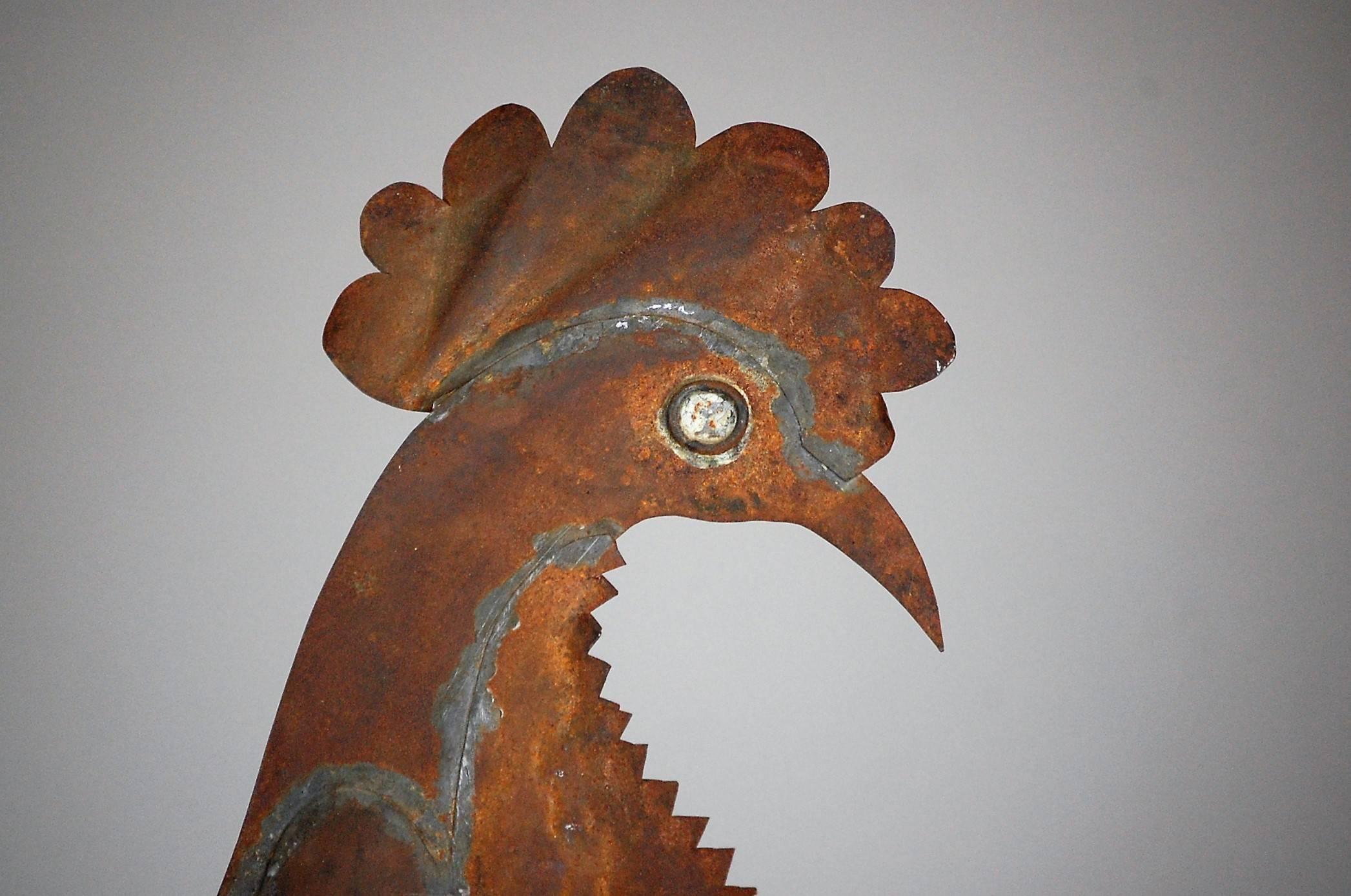 Full bodied stylised cockerel weathervane, sheet metal. France, second quarter of the 20th century. Later stand.