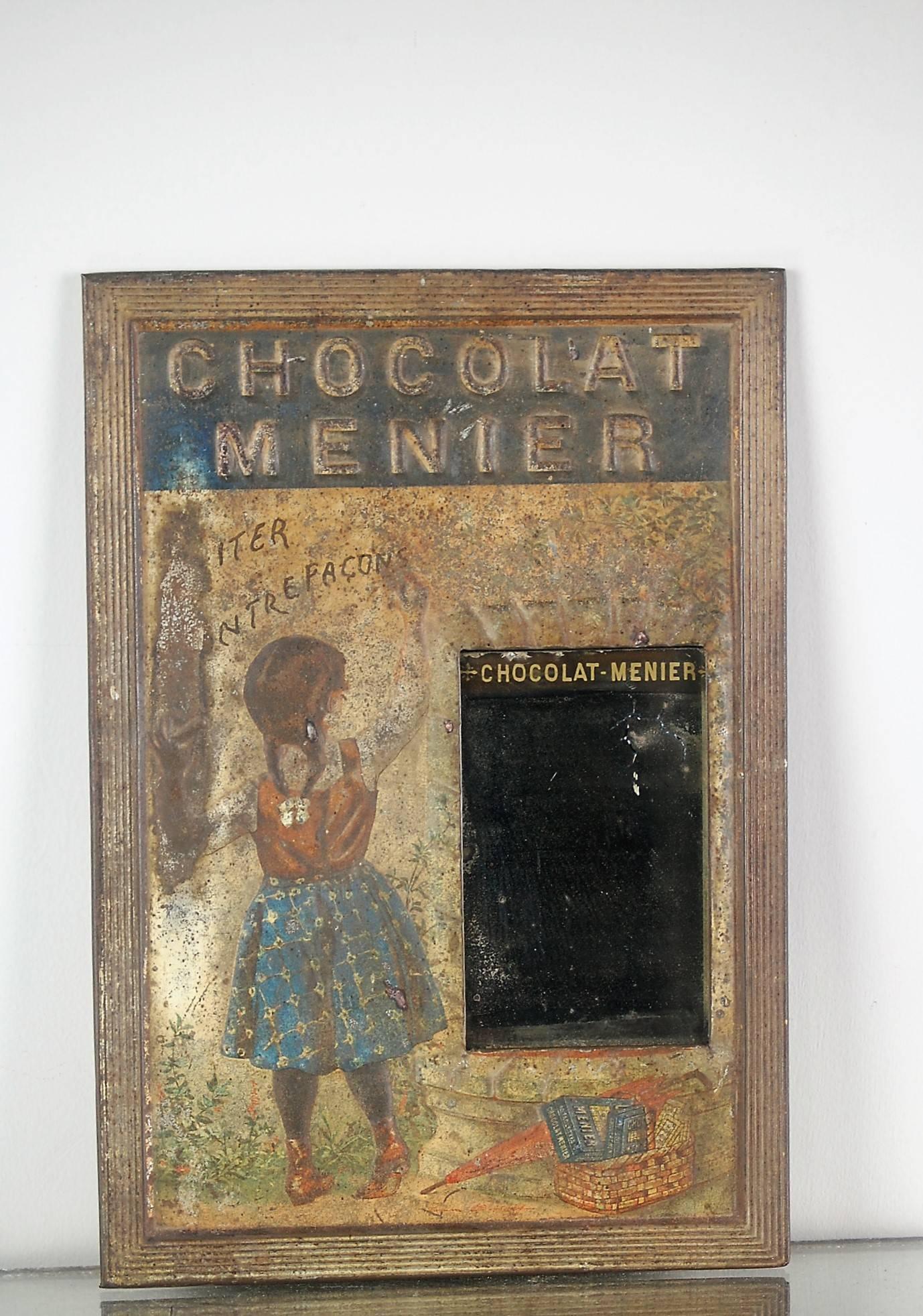 Charming Menier Chocolat point of sale advertising mirror. Original printing of this iconic image by Firmin Bouisset. Produced in the 1890s. Totally original. Mirror is distressed, painted tin is worn.