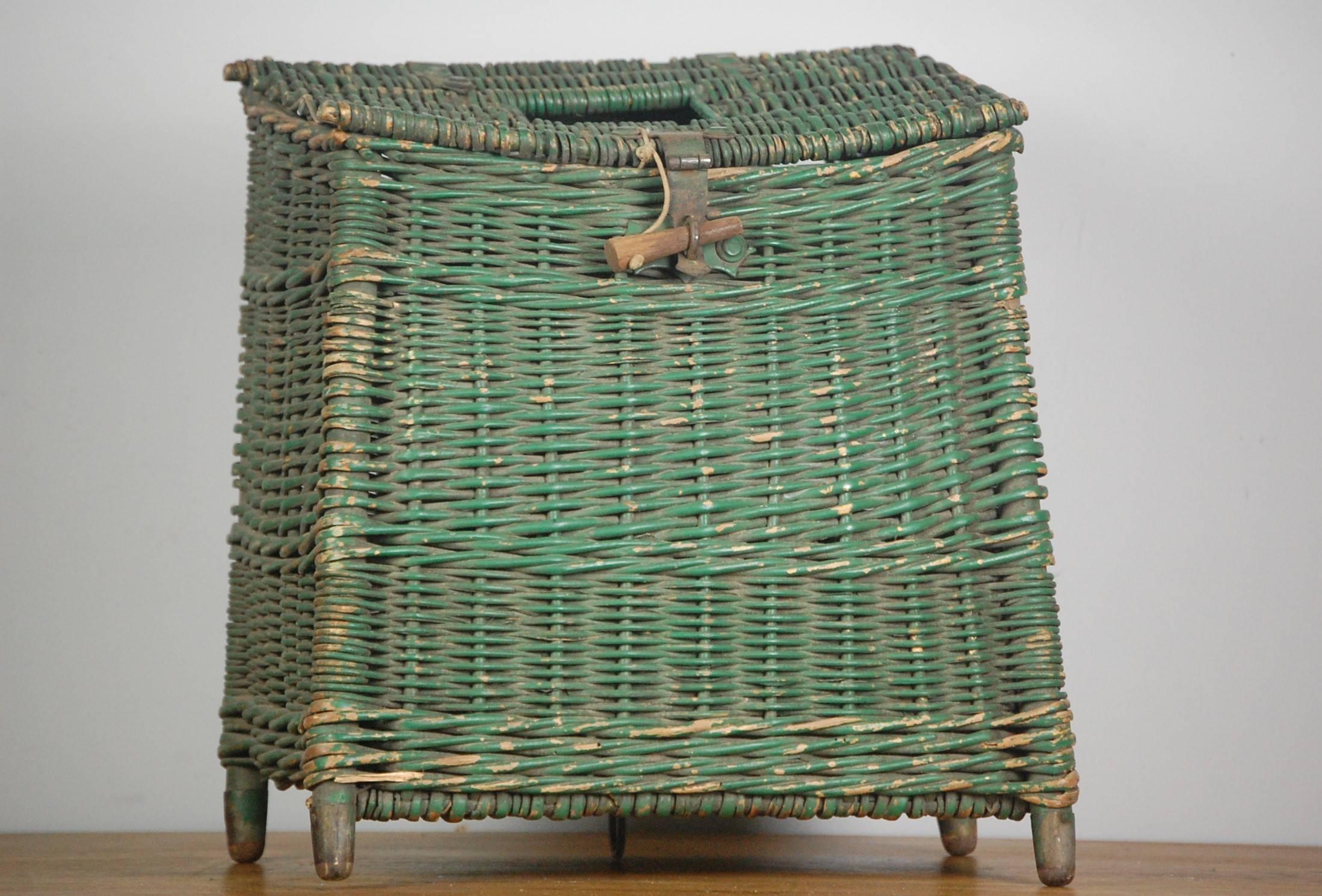 Early 20th century wicker fishing creel, wonderful condition retaining much of its original green paint. French, circa 1920.