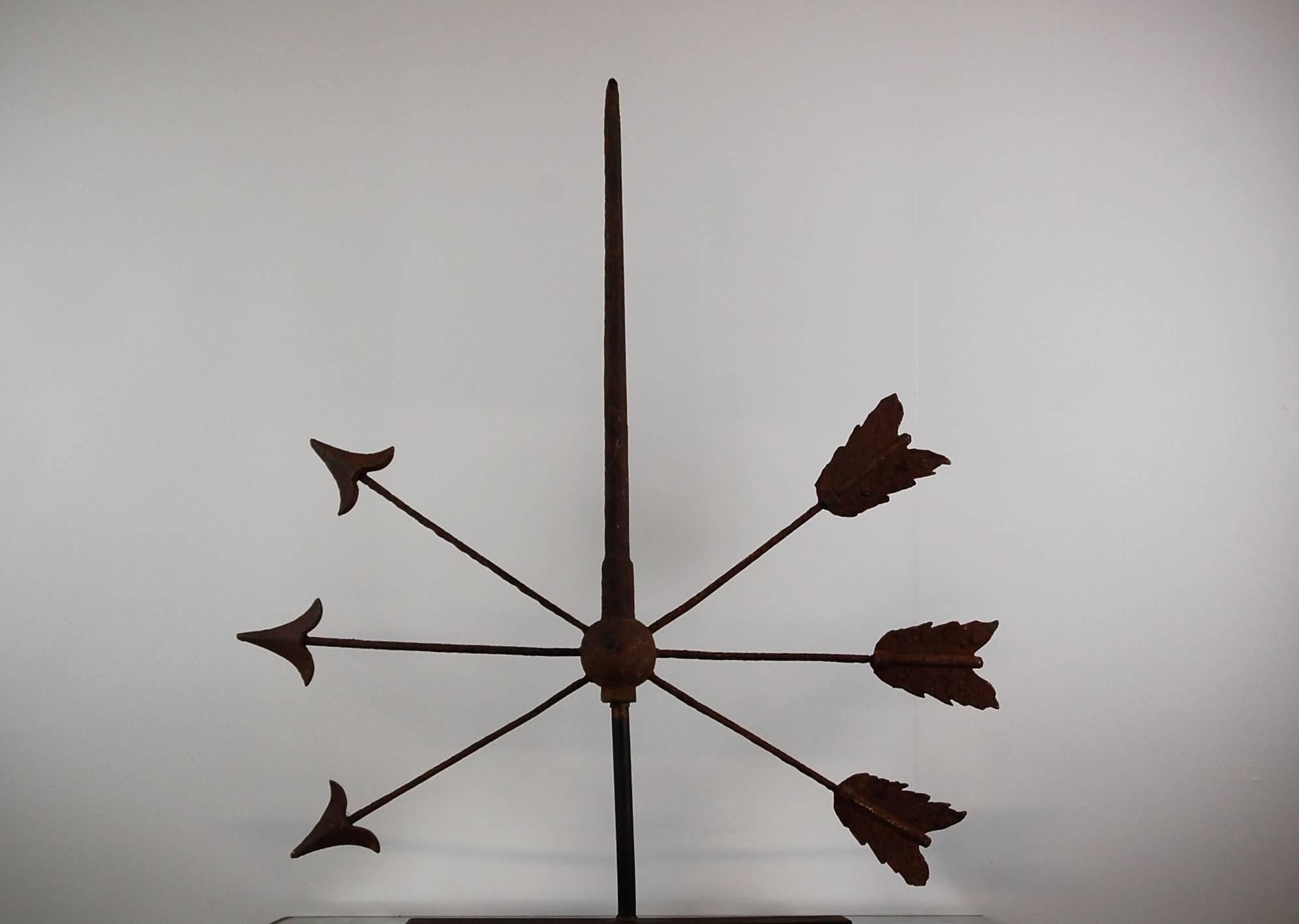 Late 19th century wrought iron arrow weathervane, trio of crossed arrows, totally original untouched condition. Later steel stand.