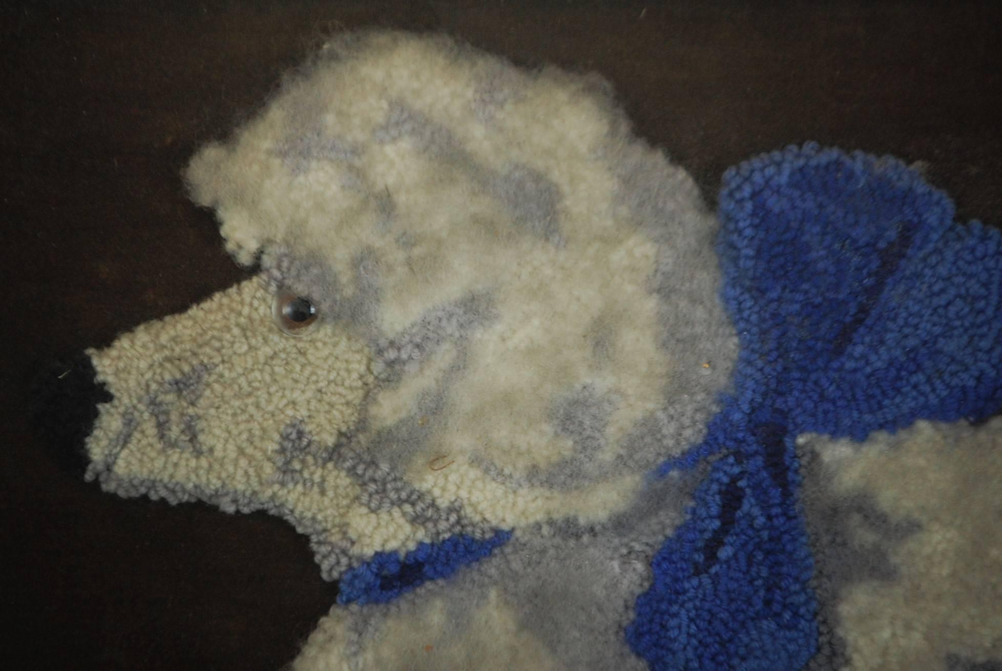 Late 19th century, Victorian unusual wool work depicting a French poodle on velvet. Wonderful execution and detail complete with glass eye, presumably a beloved pet.