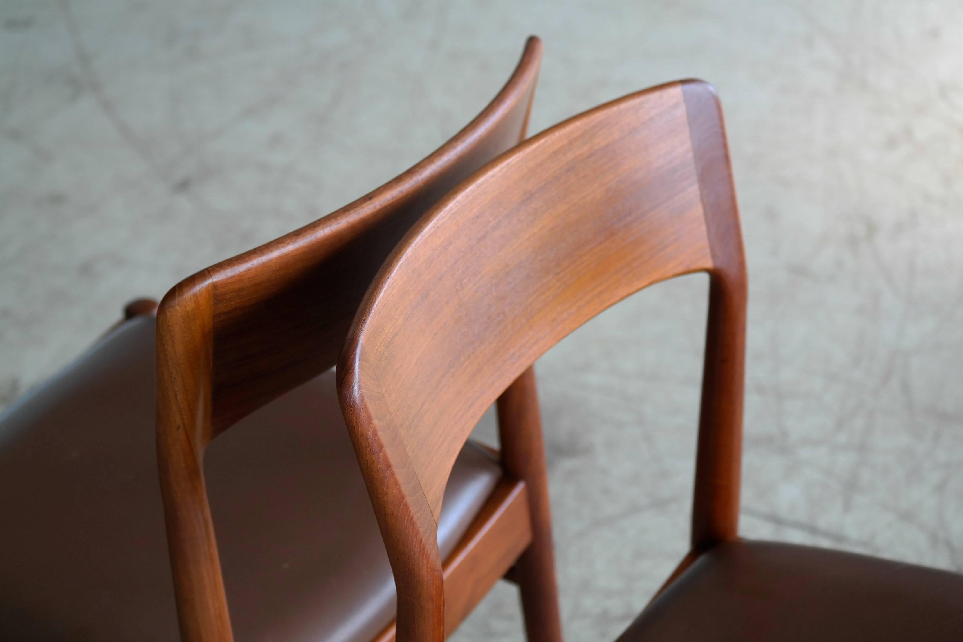 Fantastic set of ten dining chairs teak with leather seats designed in the 1960s by Kai Kristiansen for K.S. Mobler of Denmark. The style of the Kai Kristiansen chairs is easily mistaken for N. O Moller and they are of a very comfortable and classic