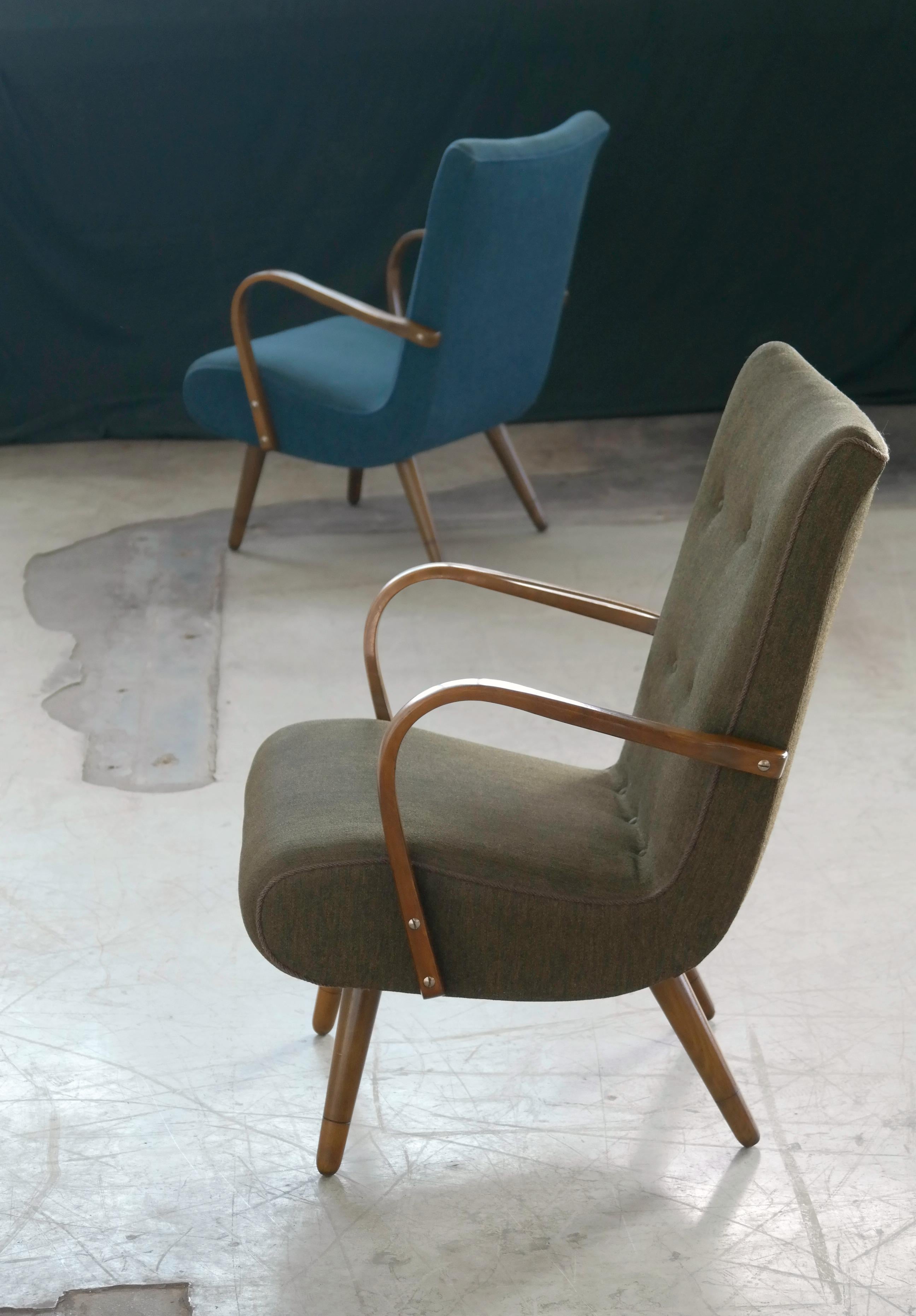 Pair of Danish 1950s Sculptural Lounge Chairs with Curved Wooden Armrests 1