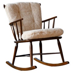 Faarstrup 1950 Low Backrest Spindle Back Rocking Chair with Shearling Cushions