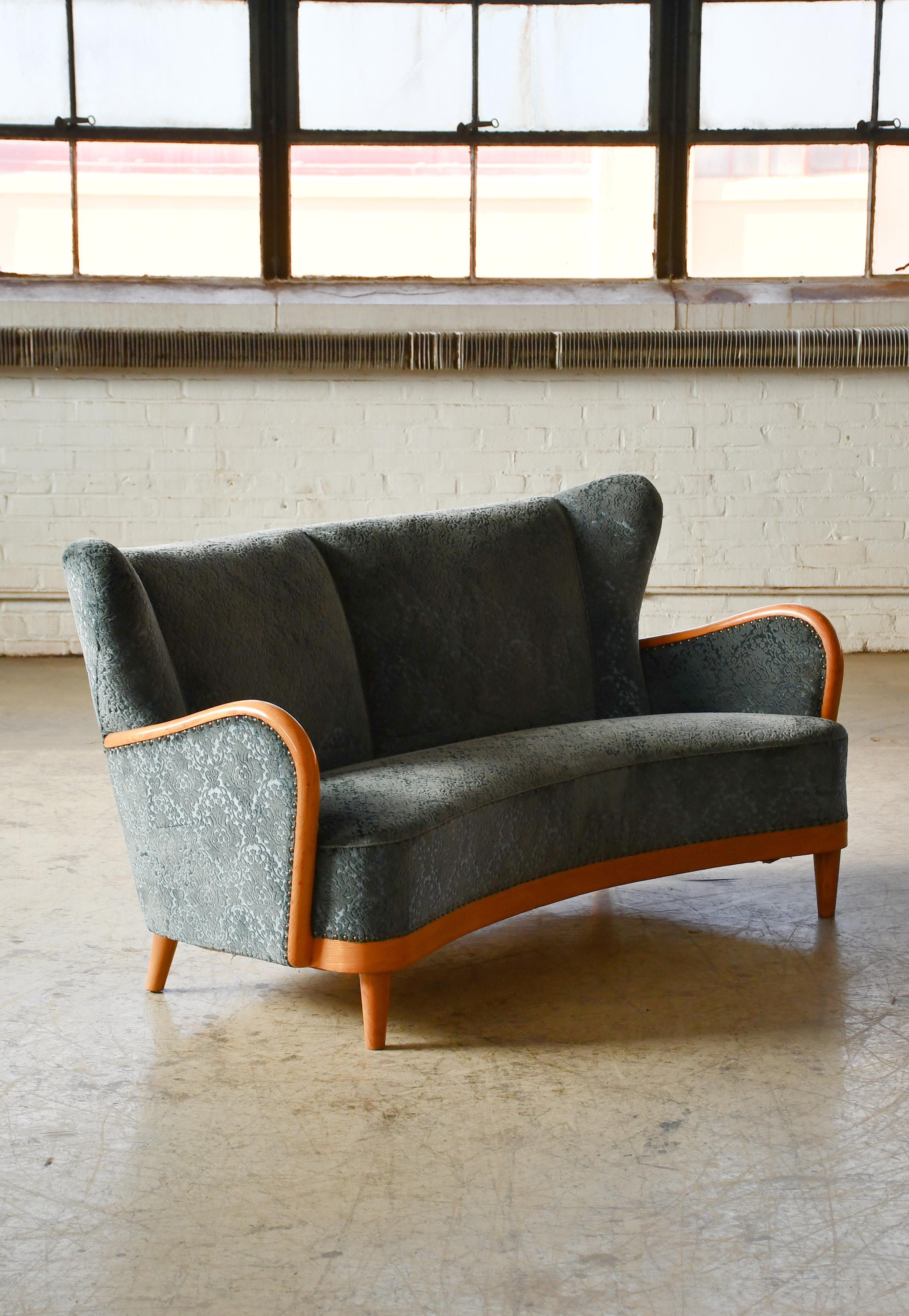 Mid-20th Century Scandinavian 1940s Curved Sofa with Open Armrests and Maple Accents For Sale