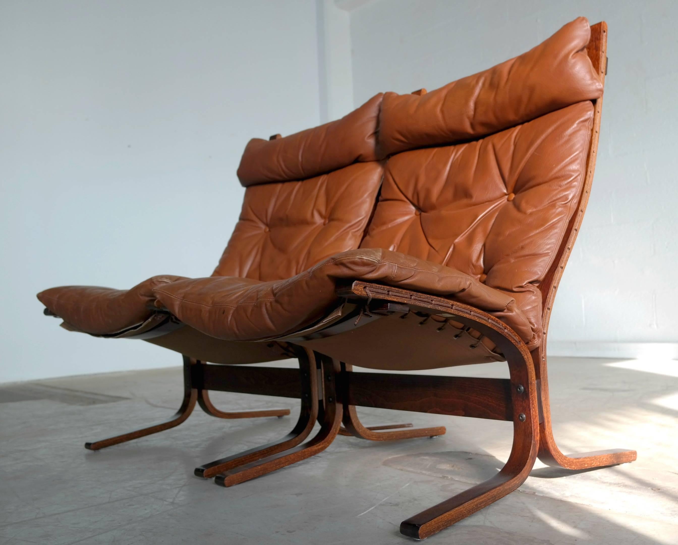 Pair of Leather Easy Chairs Model 