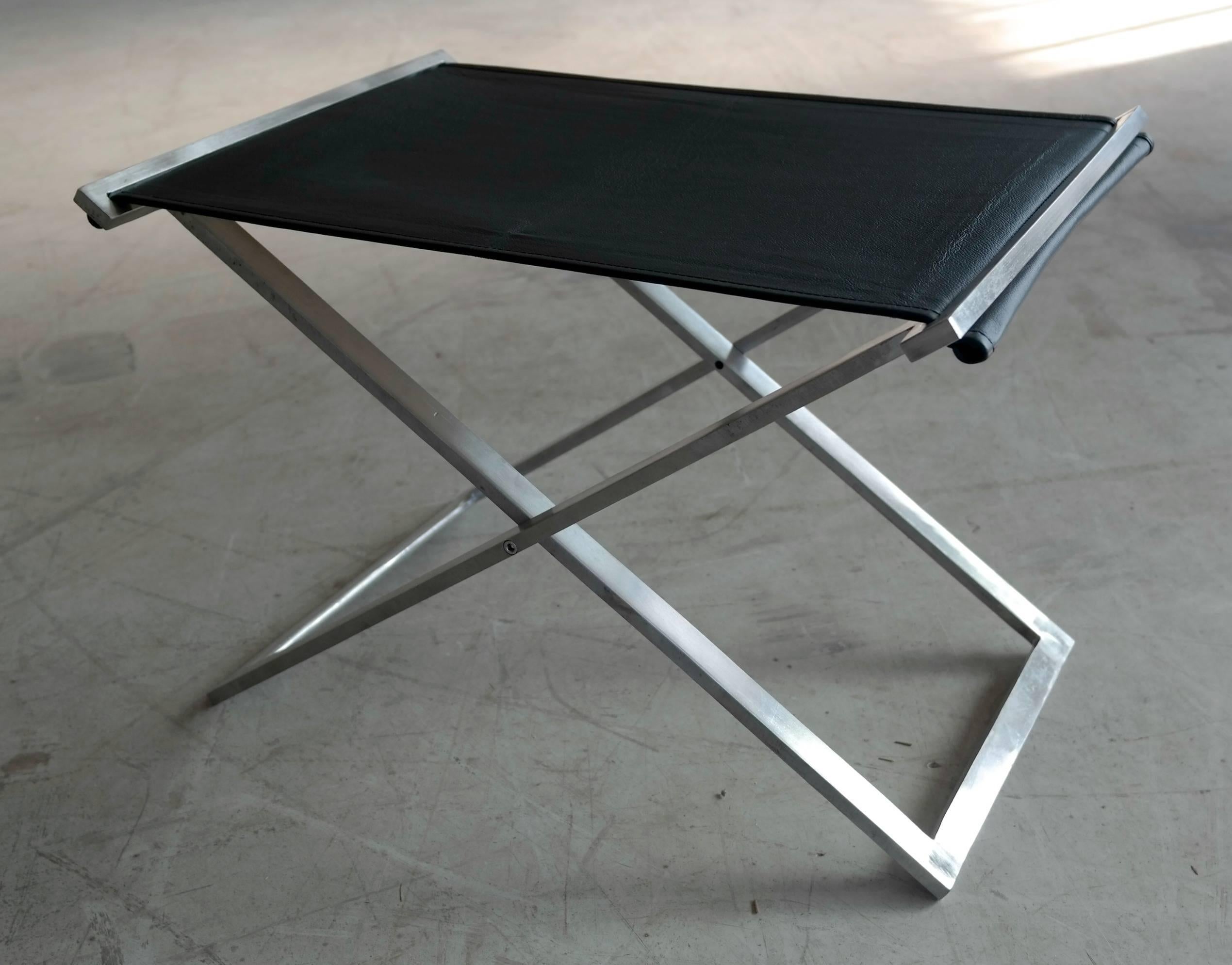 Ever thought a folding stool could be cool? Folding stool model rough#1 by Michael Christensen, Denmark. Made from 10mm hand-wrought flat steel frame. Seat fitted with black aniline leather with pale canvas supportive material. Very sturdy and well