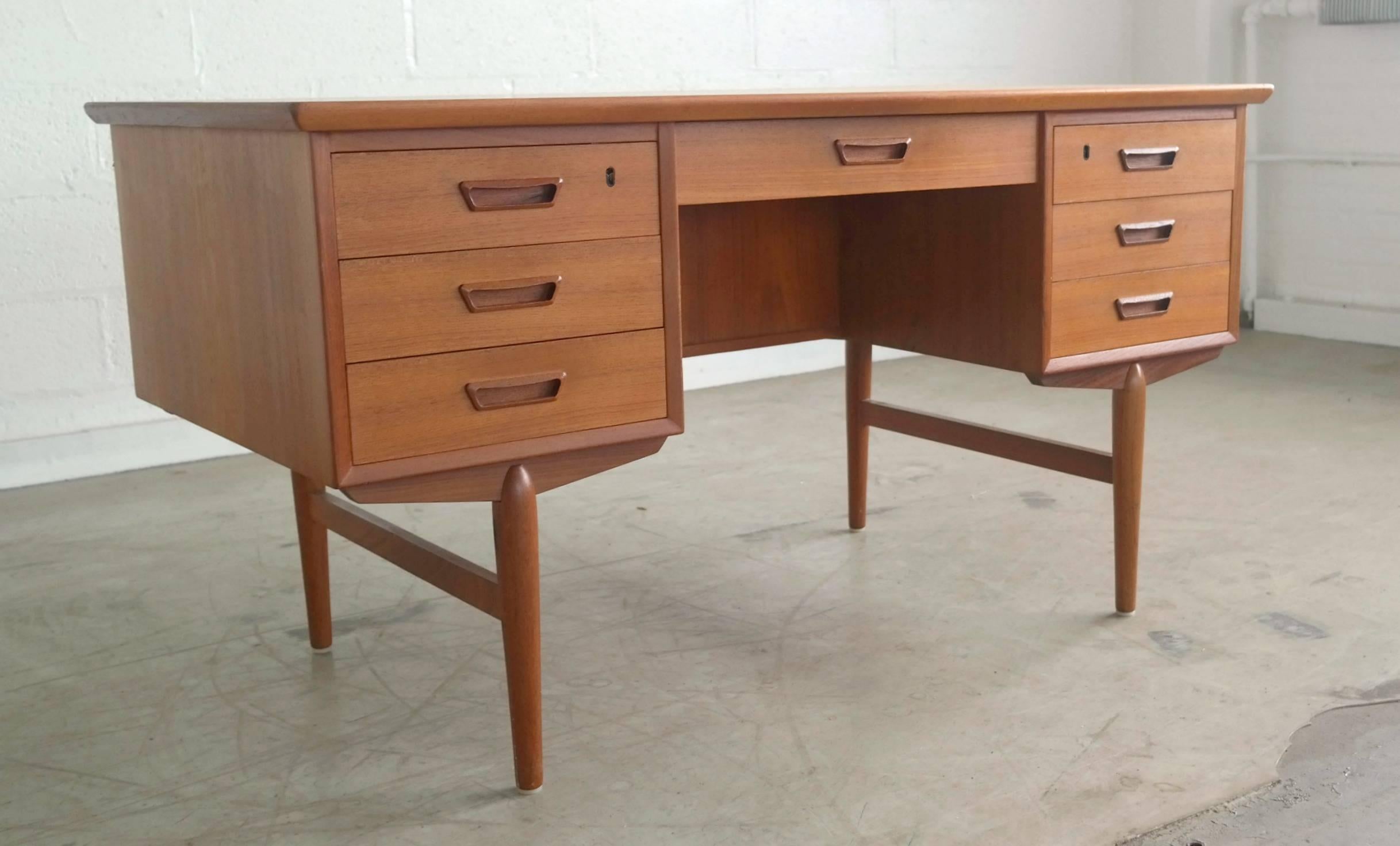 Stylish high-quality, Danish, 1960s desk in teak. Finished on both side and can fit anywhere in a room. Excellent condition.