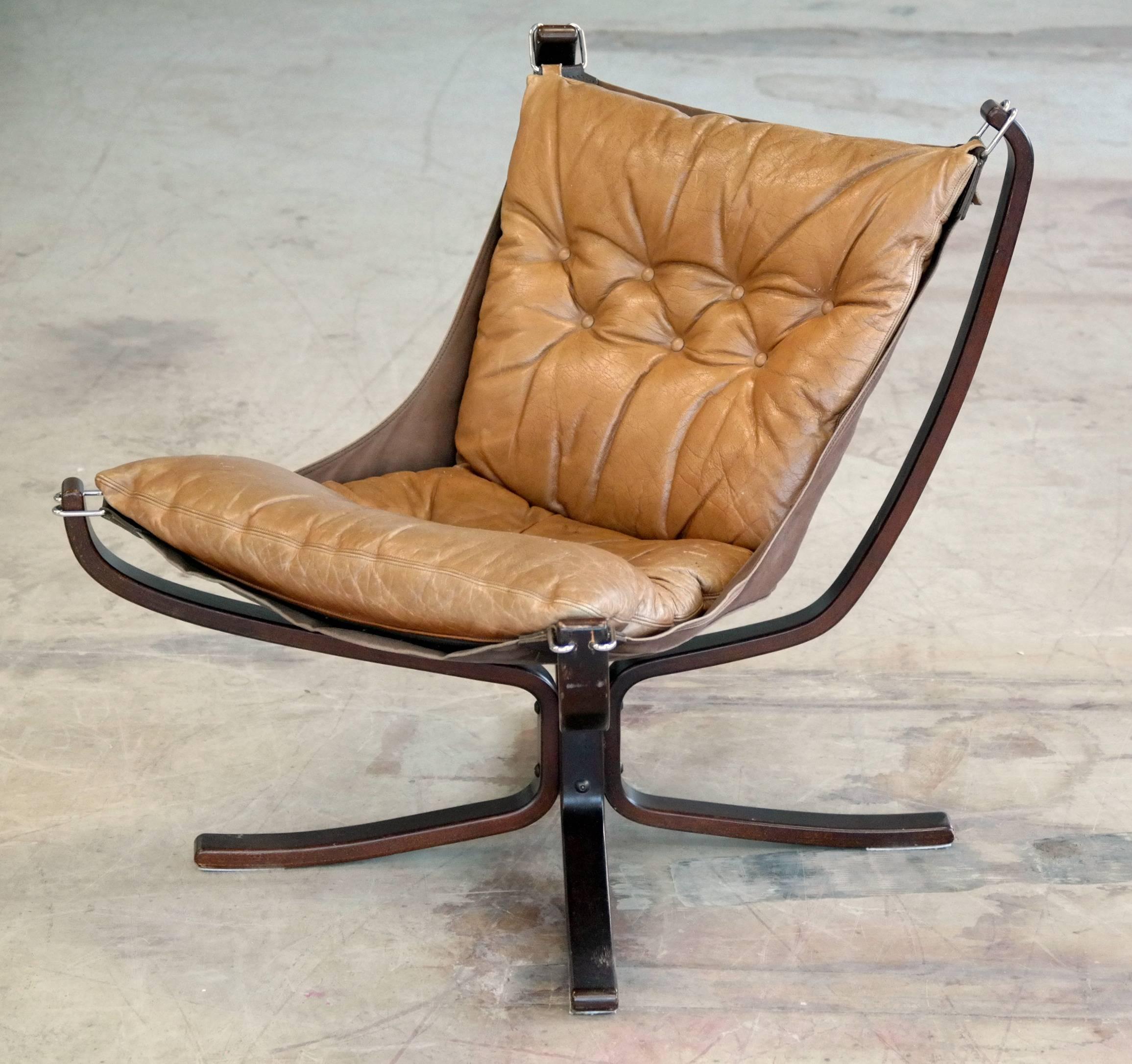 The Classic falcon chair in beautifully patinated cognac colored Leather by Sigurd Ressell for Vatne Mobler, Norway.