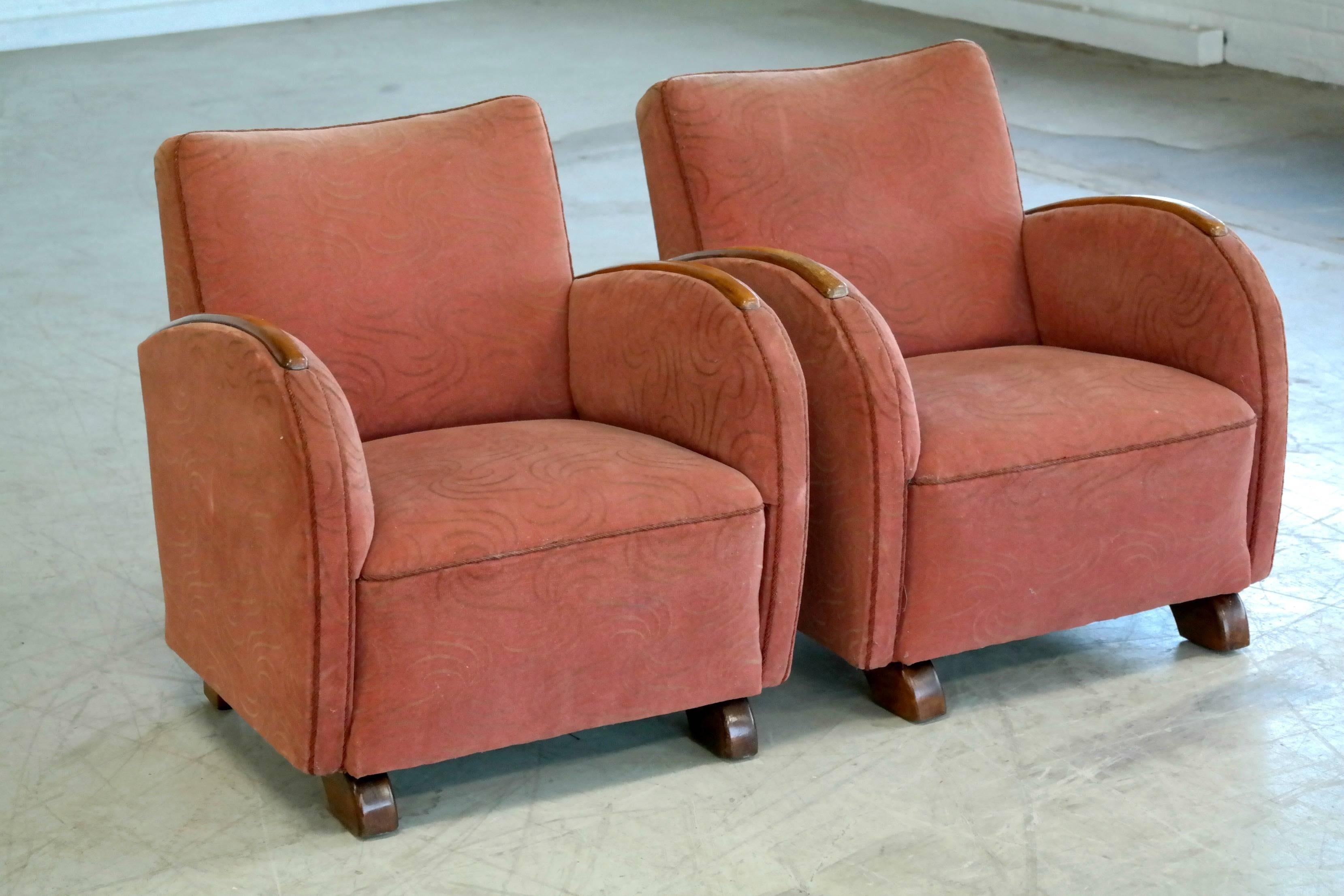 Luxurious Danish Art Deco club chairs very typical of the period with block feet arm armrests made of bentwood birch. The chairs are sturdy and the seat and backrest firm, however, the fabric shows some light soiling and needs to be replaced.
 